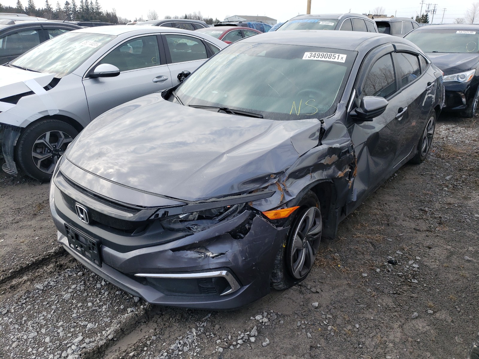 Photo 2 from auction – 2019 HONDA CIVIC LX with VIN 2HGFC2F56KH002058