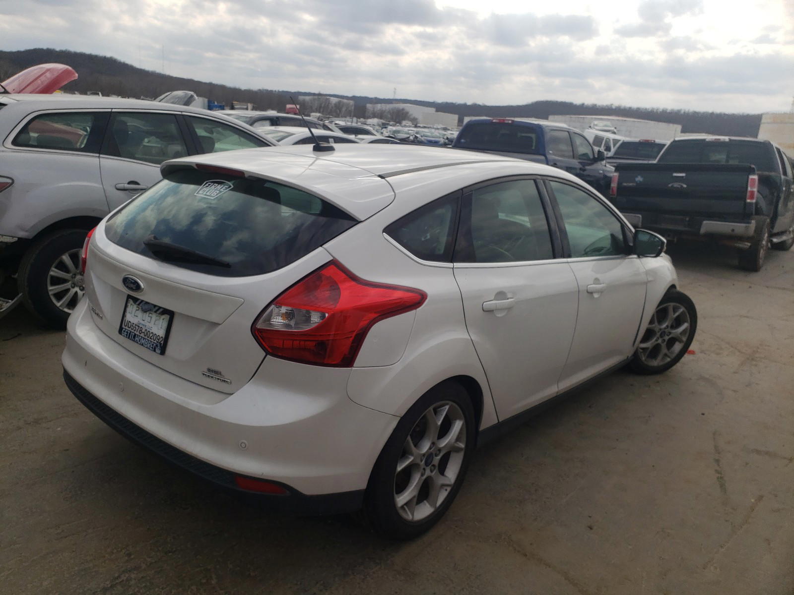 Photo 4 from auction – 2012 FORD FOCUS SEL with VIN 1FAHP3M2XCL476034