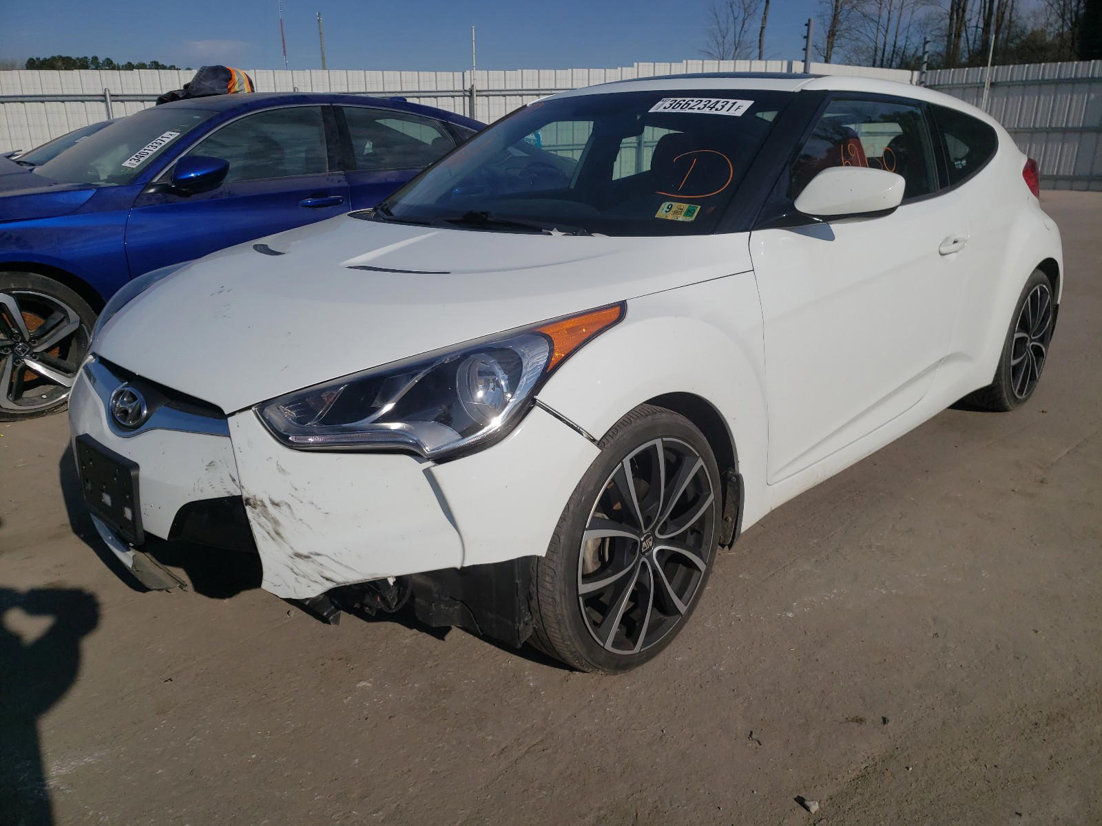 Photo 2 from auction – 2013 HYUNDAI VELOSTER with VIN KMHTC6AD2DU157225