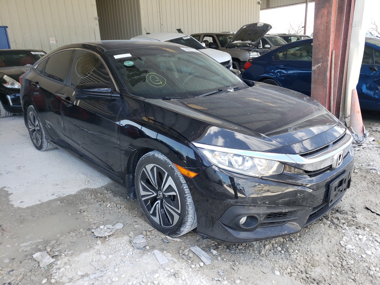 HONDA CIVIC EX 2017 with VIN 19XFC1F3XHE200847 - Photo from auction