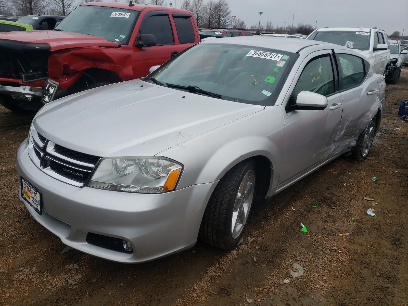 Photo 2 from auction – 2011 DODGE AVENGER LU with VIN 1B3BD2FG7BN572378