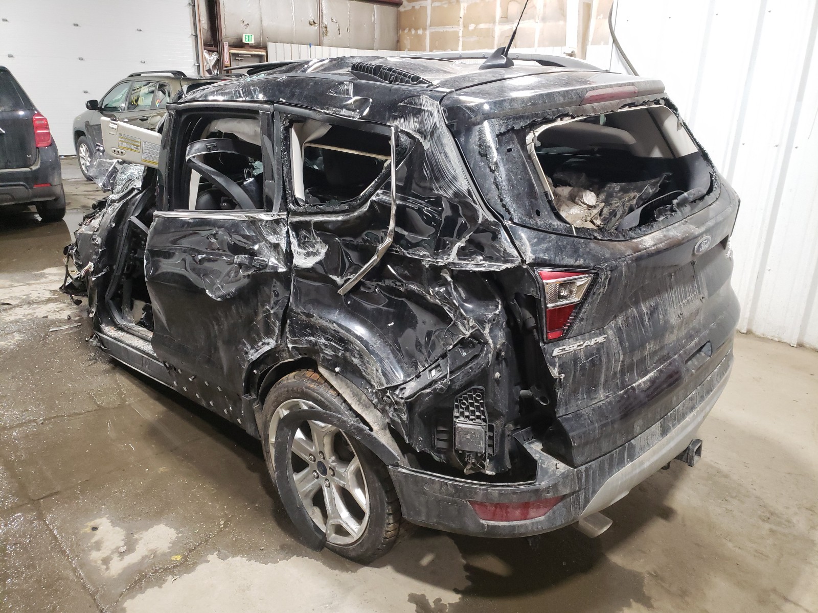 Photo 3 from auction – 2019 FORD ESCAPE TIT with VIN 1FMCU9J92KUB29089