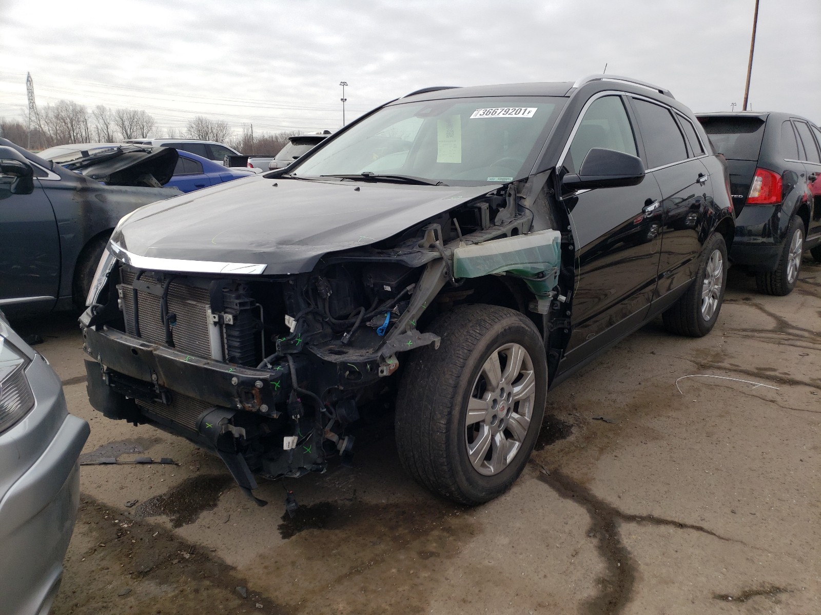 Photo 2 from auction – 2014 CADILLAC SRX LUXURY with VIN 3GYFNBE39ES569398