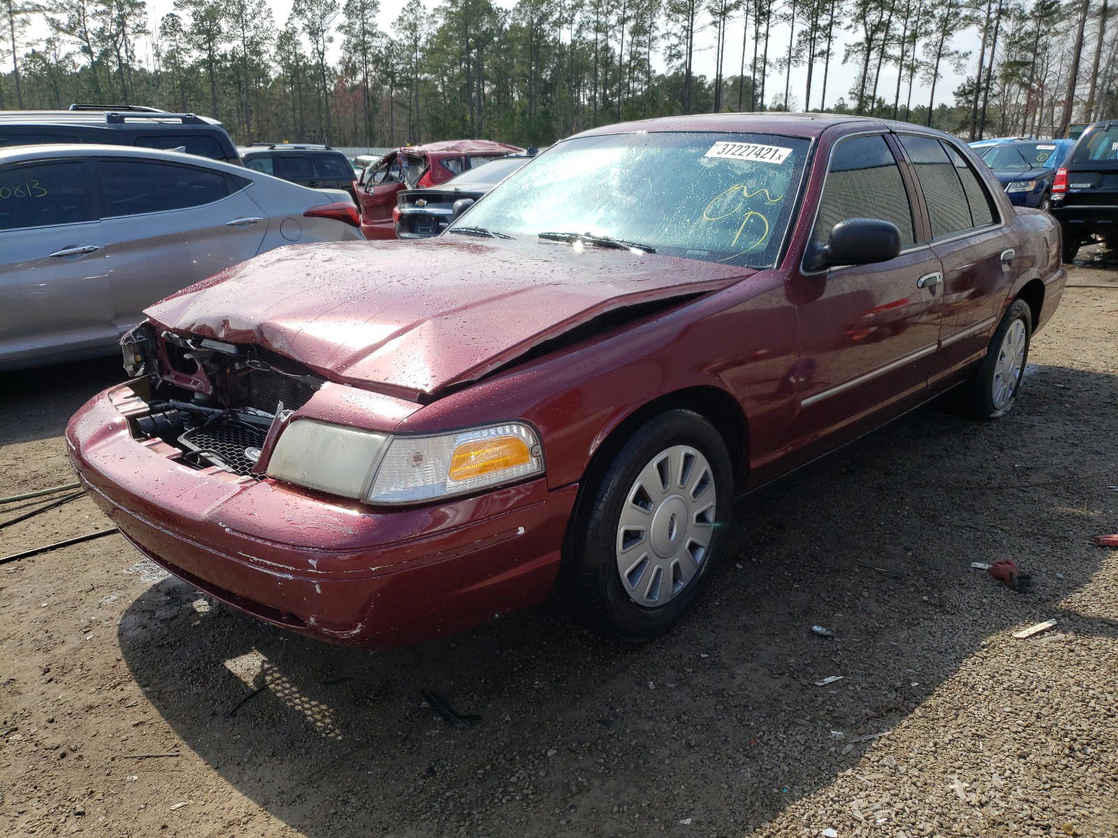 Photo 2 from auction – 2011 FORD CROWN VICT with VIN 2FABP7BV8BX169652