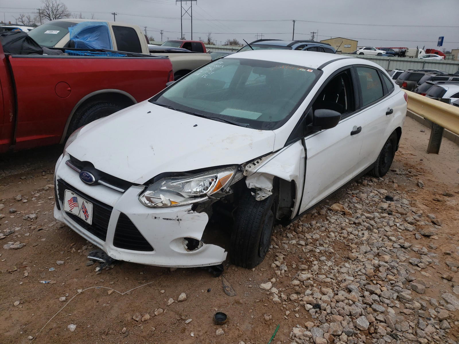 Photo 2 from auction – 2012 FORD FOCUS S with VIN 1FAHP3E24CL250232