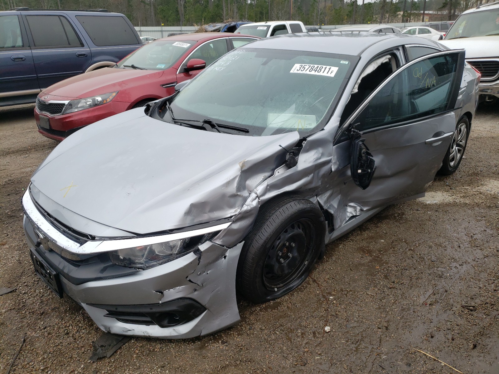 Photo 2 from auction – 2016 HONDA CIVIC LX with VIN 19XFC2F51GE015043