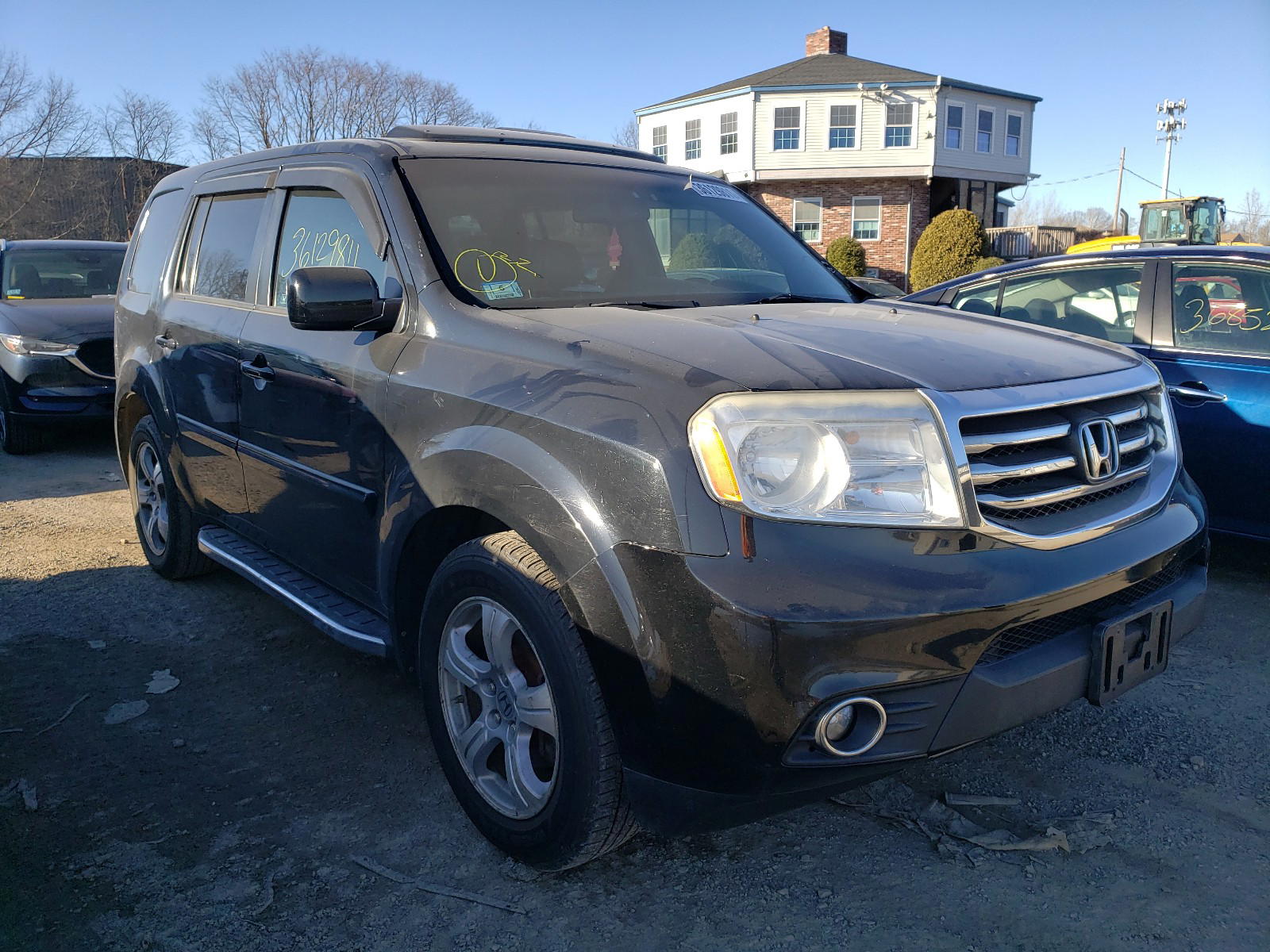 HONDA PILOT EXLN 2012 with VIN 5FNYF4H79CB001292 - Photo from auction