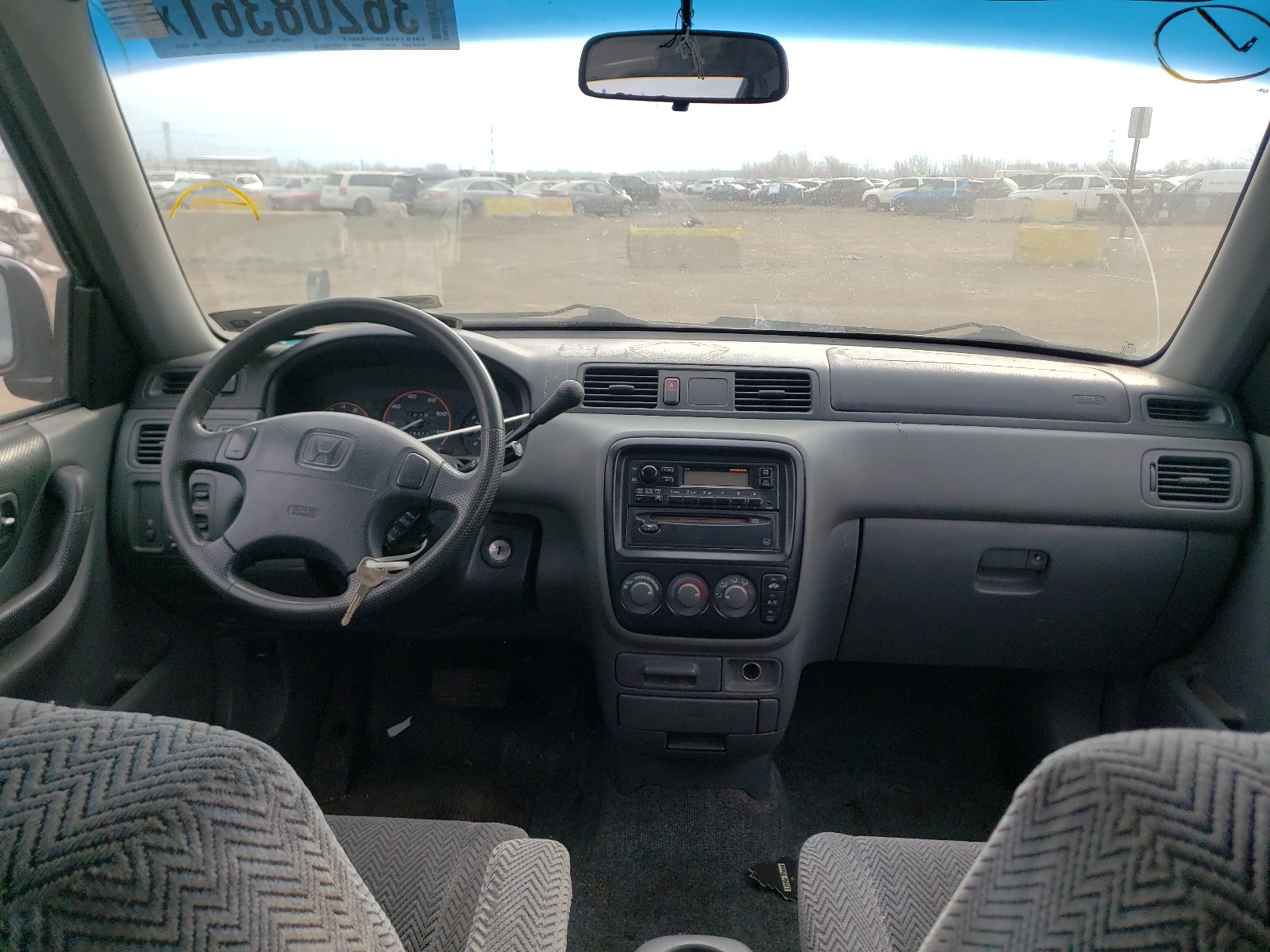 Photo 9 from auction – 1997 HONDA CR-V LX with VIN JHLRD1856VC029075