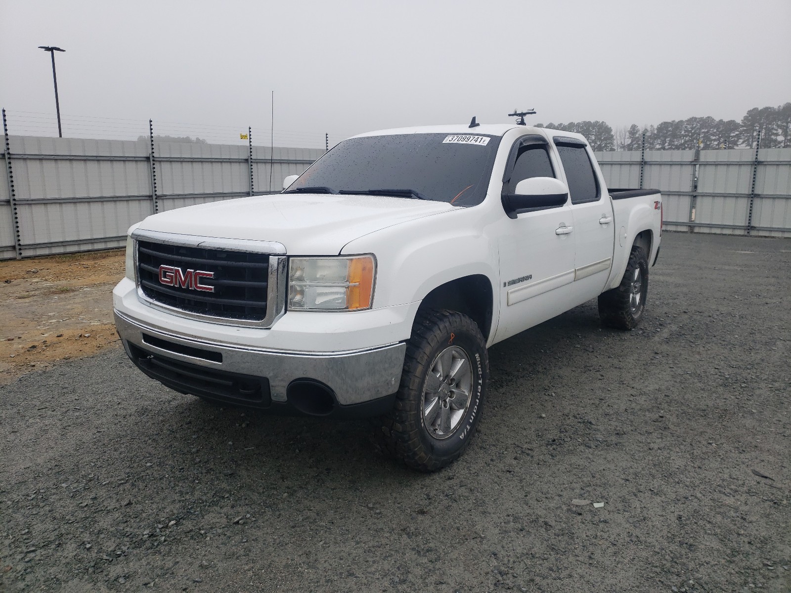 Photo 2 from auction – 2009 GMC SIERRA K15 with VIN 3GTEK33389G140054