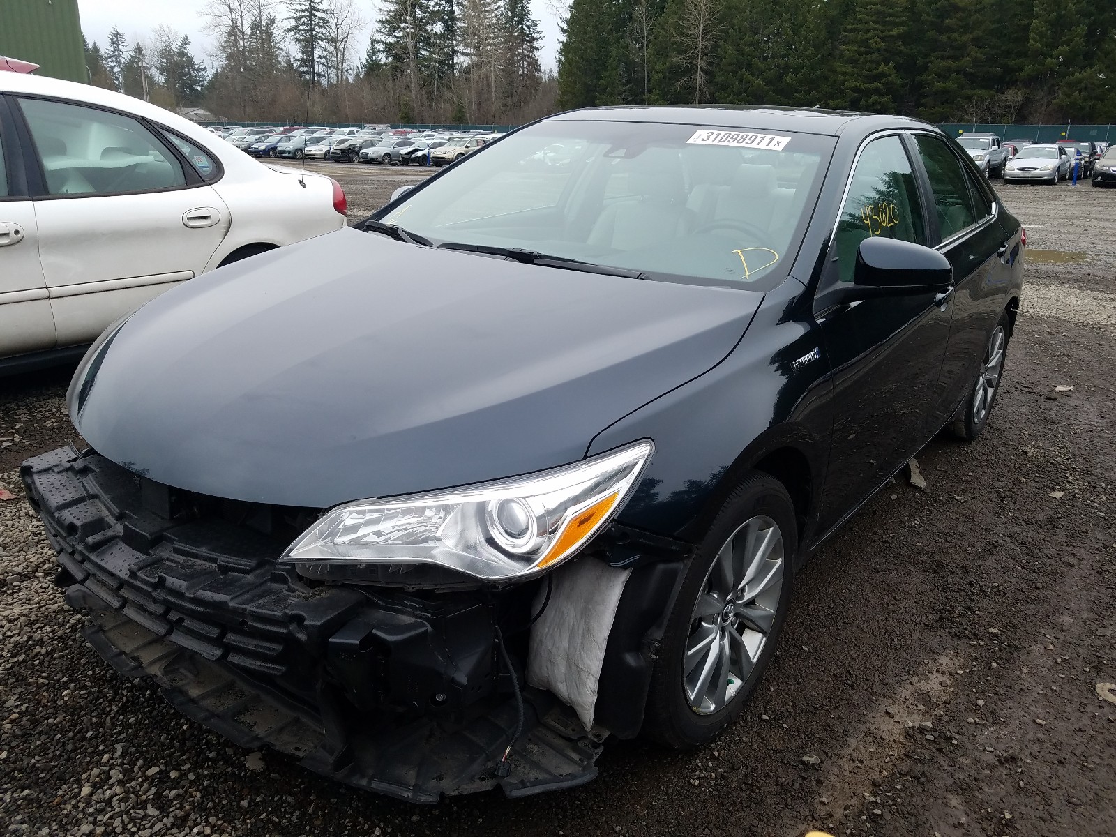 Photo 2 from auction – 2016 TOYOTA CAMRY HYBR with VIN 4T1BD1FK4GU182702