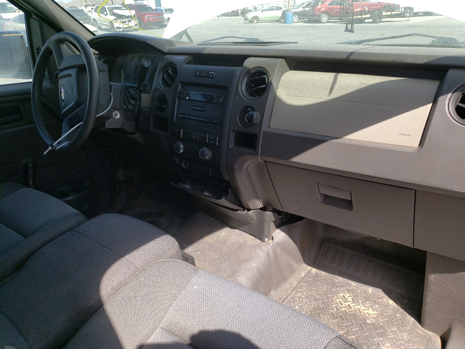 Photo 9 from auction – 2009 FORD F150 with VIN 1FTRF12W19KB06715