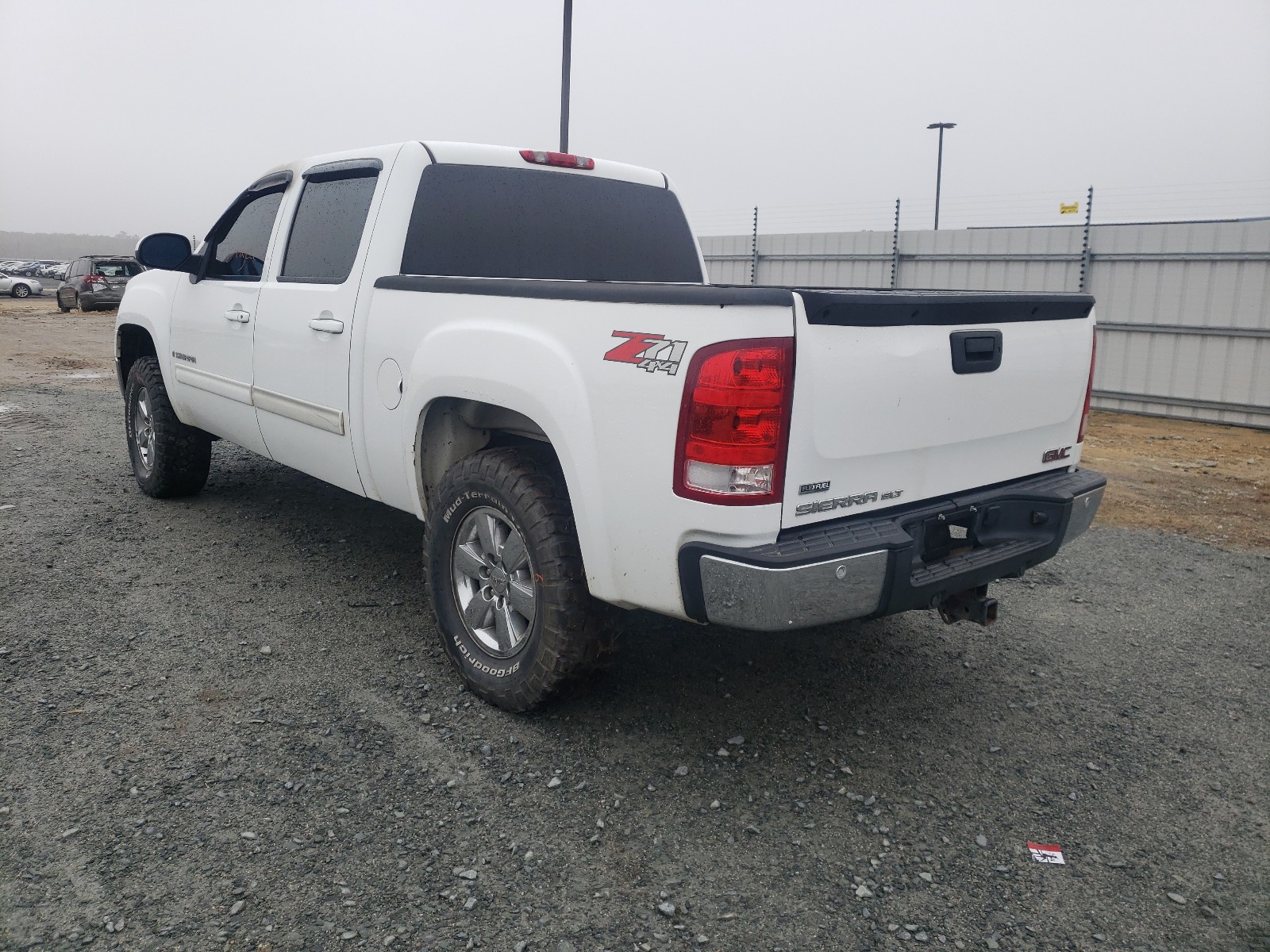 Photo 3 from auction – 2009 GMC SIERRA K15 with VIN 3GTEK33389G140054