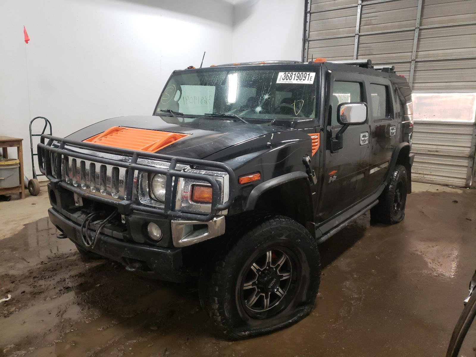 Photo 2 from auction – 2003 HUMMER H2 with VIN 5GRGN23UX3H145500