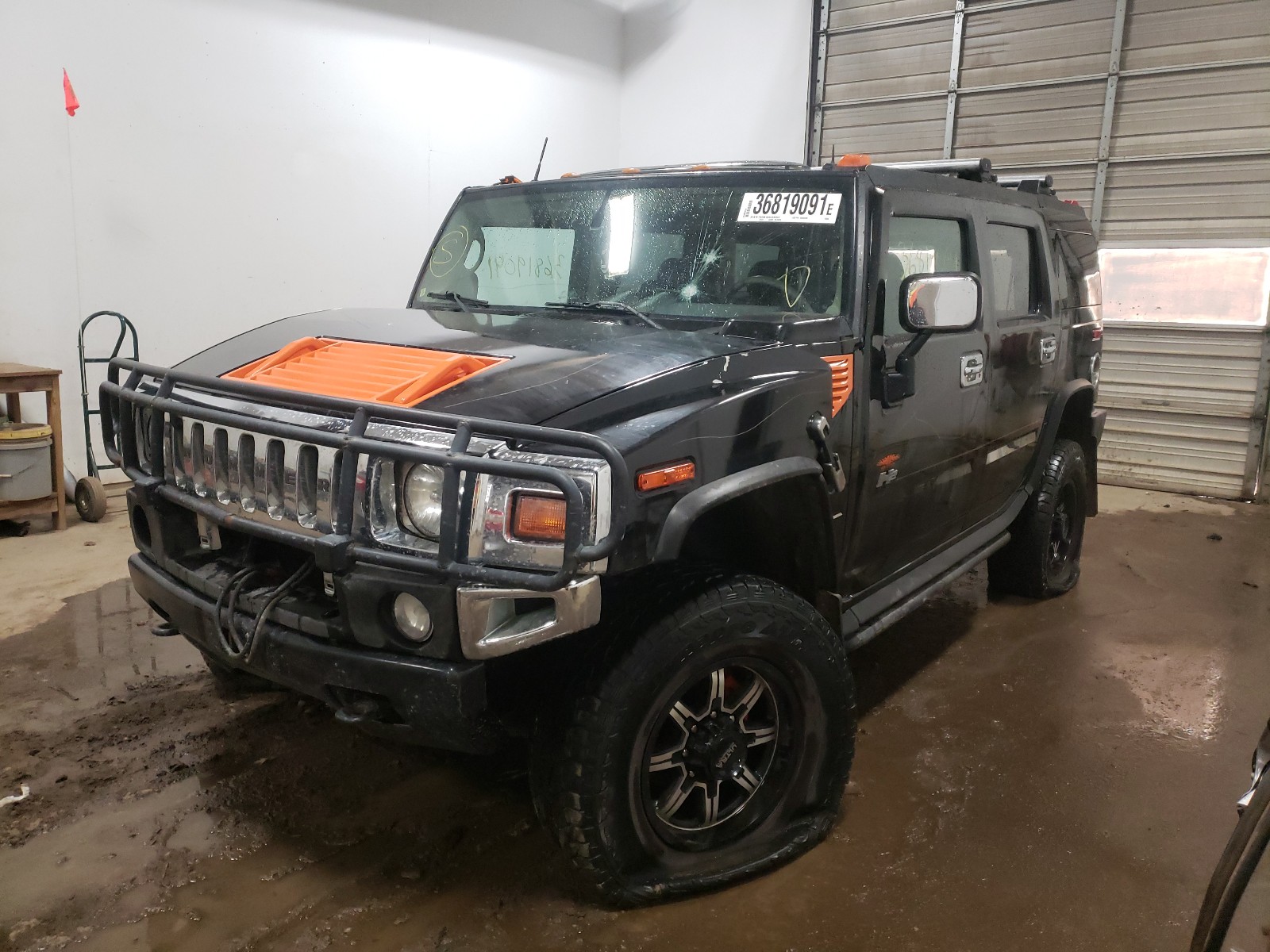 Foto 2 de la subasta – 2003 HUMMER H2 con VIN 5GRGN23UX3H145500
