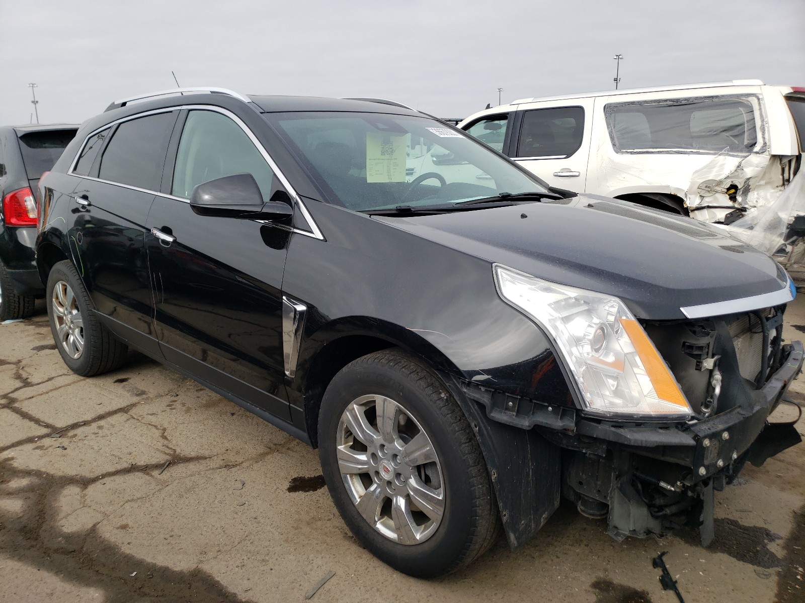 CADILLAC SRX LUXURY 2014 with VIN 3GYFNBE39ES569398 - Photo from auction