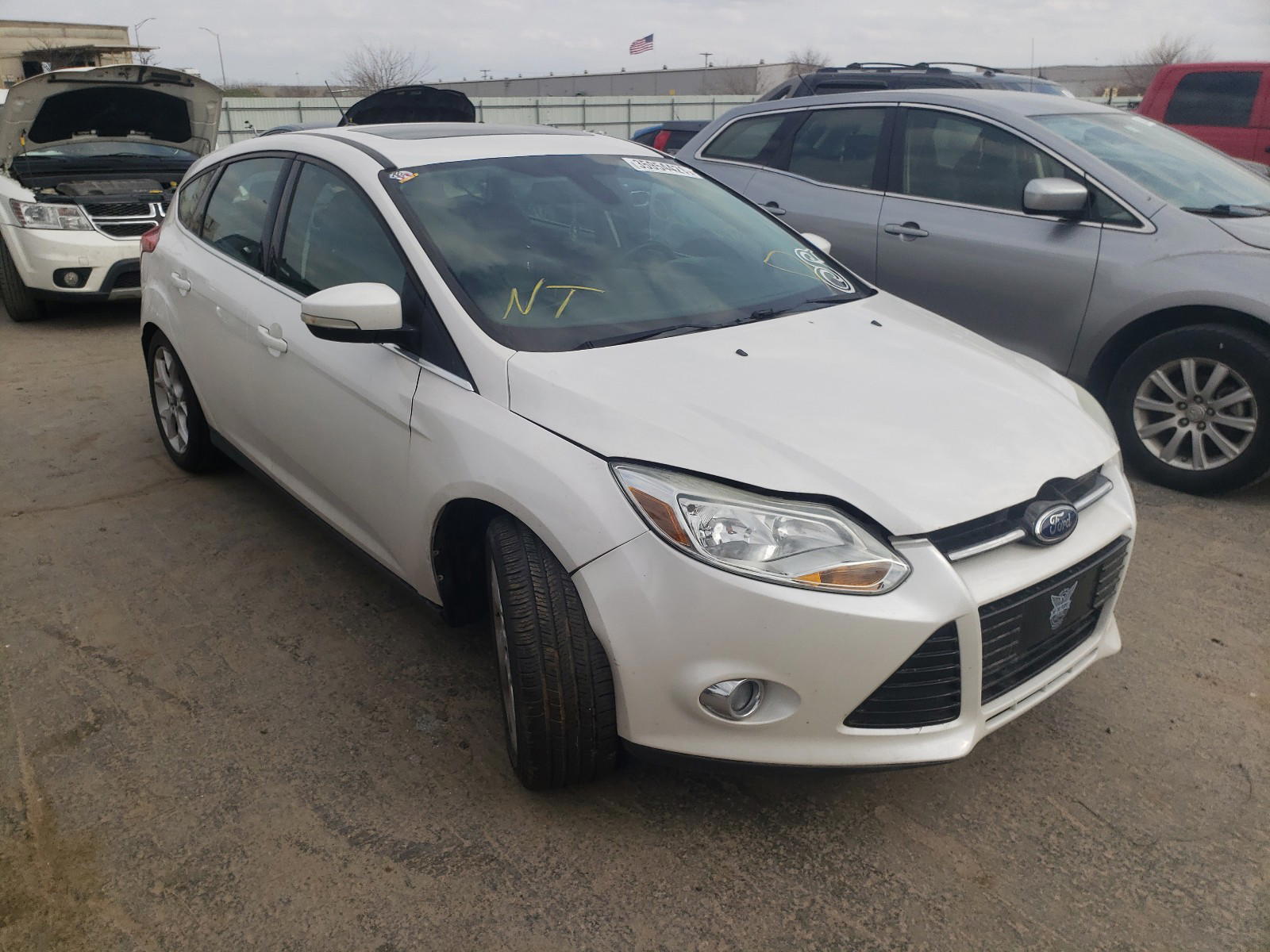 FORD FOCUS SEL 2012 with VIN 1FAHP3M2XCL476034 - Photo from auction