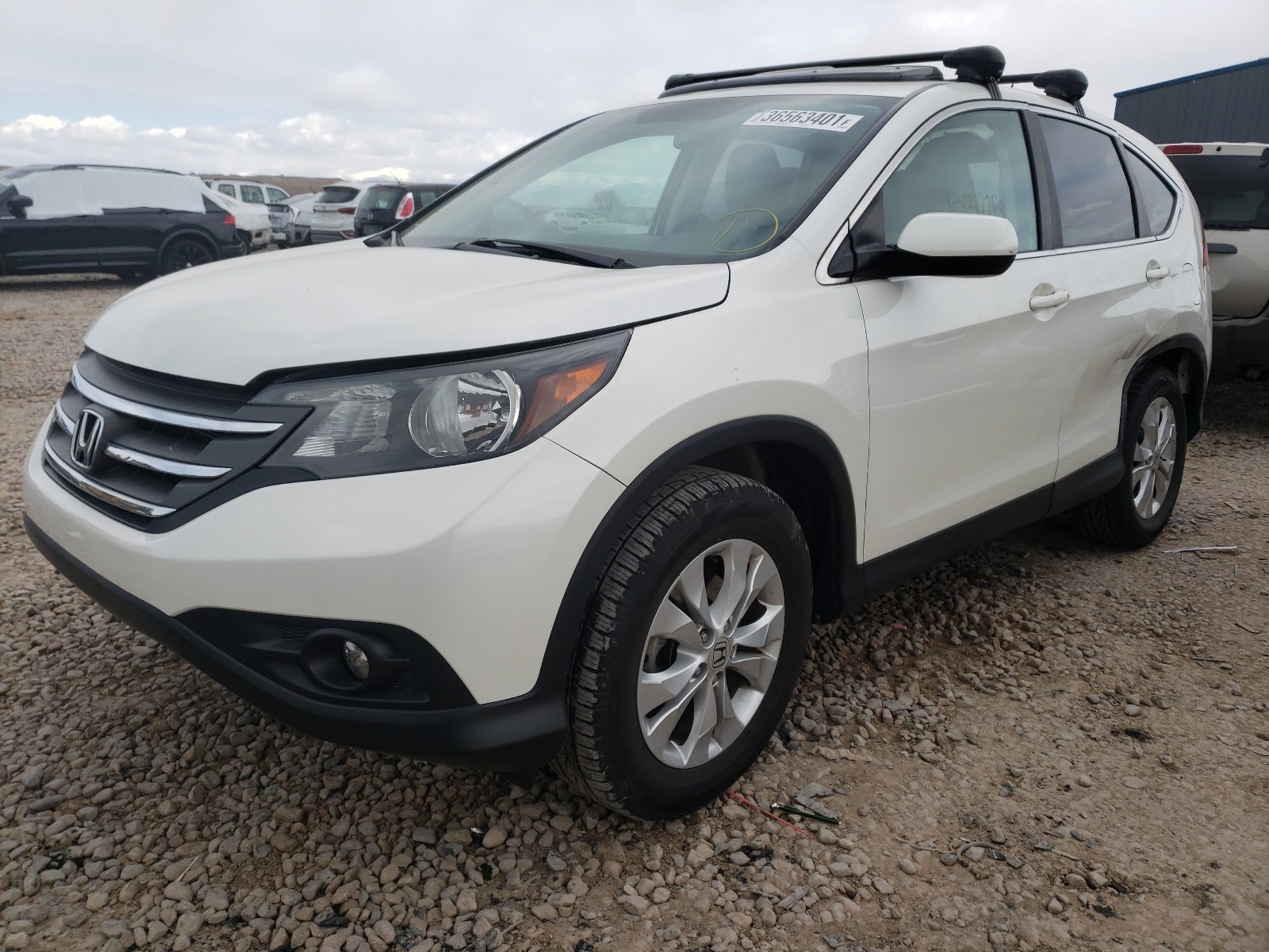 Photo 2 from auction – 2014 HONDA CR-V EX with VIN 5J6RM3H54EL040434