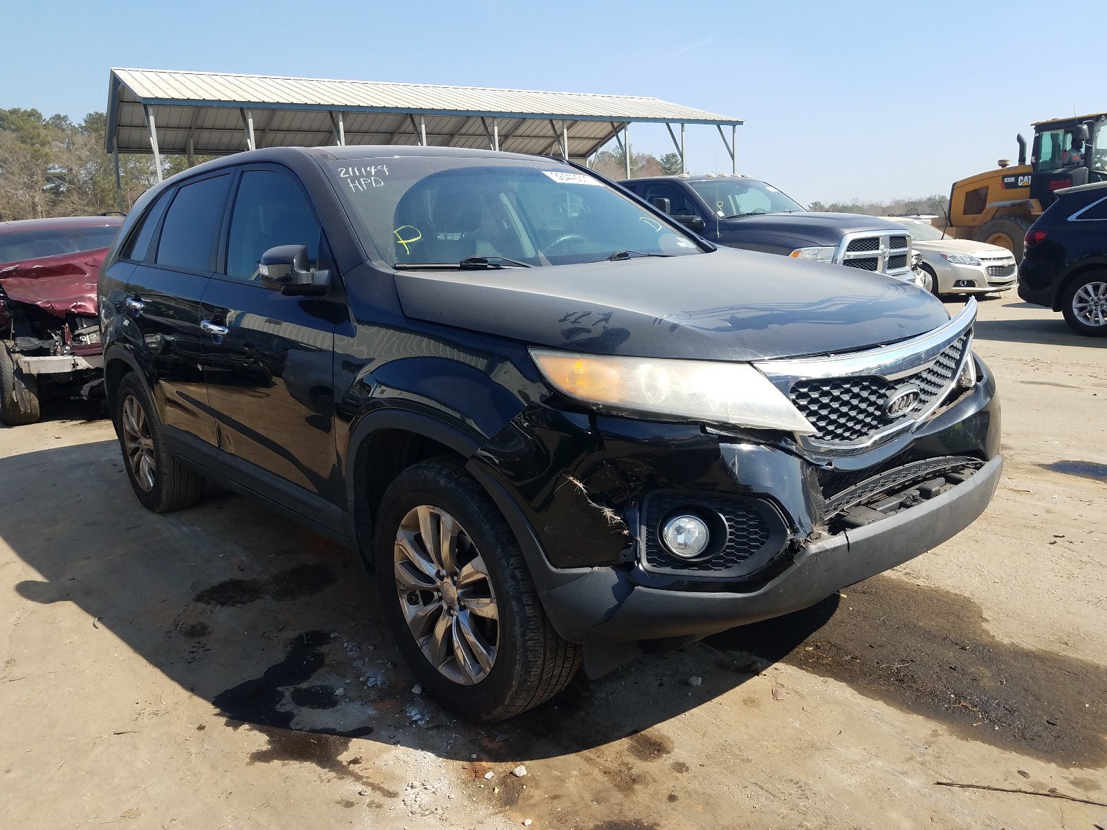 KIA SORENTO EX 2011 with VIN 5XYKU4A27BG004936 - Photo from auction