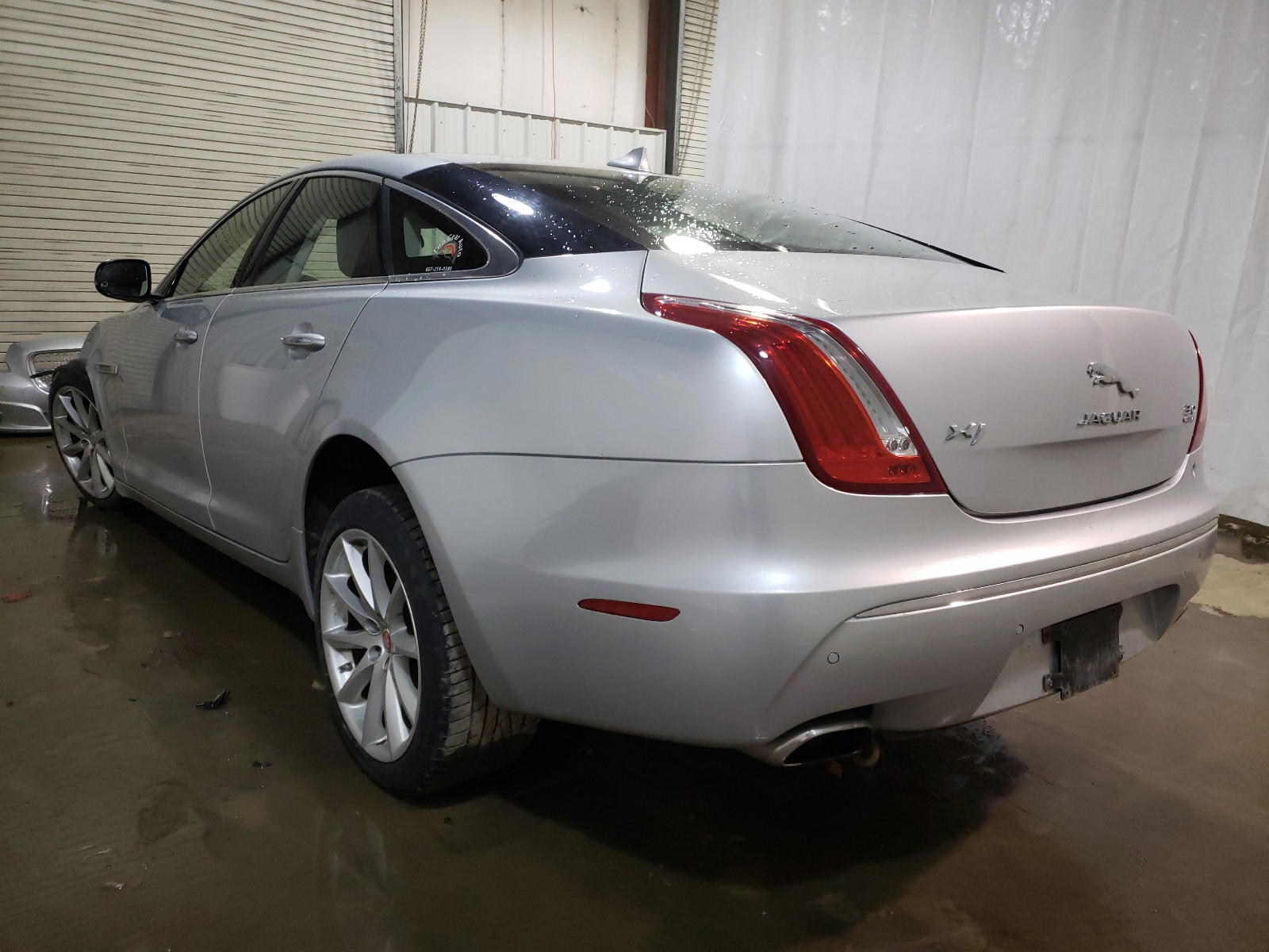 Photo 3 from auction – 2014 JAGUAR XJ with VIN SAJWJ1CD4E8V61212