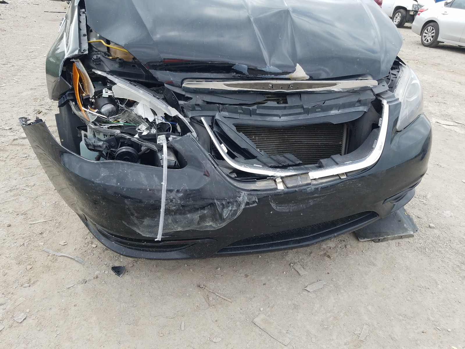 Photo 9 from auction – 2013 CHRYSLER 200 TOURIN with VIN 1C3CCBBG6DN745164
