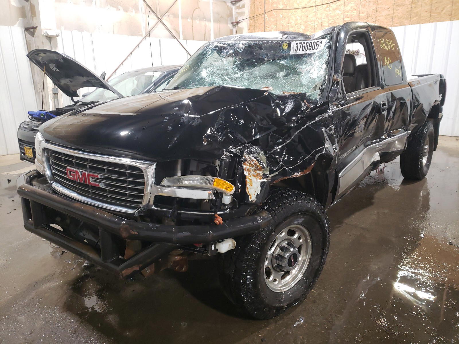 Photo 2 from auction – 2002 GMC SIERRA K25 with VIN 1GTHK29182E115293