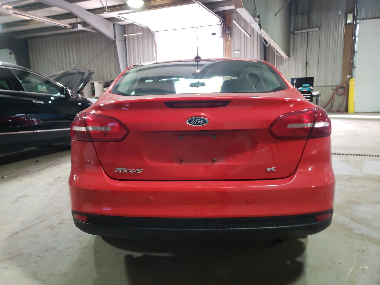 Photo 9 from auction – 2015 FORD FOCUS SE with VIN 1FADP3F2XFL292910