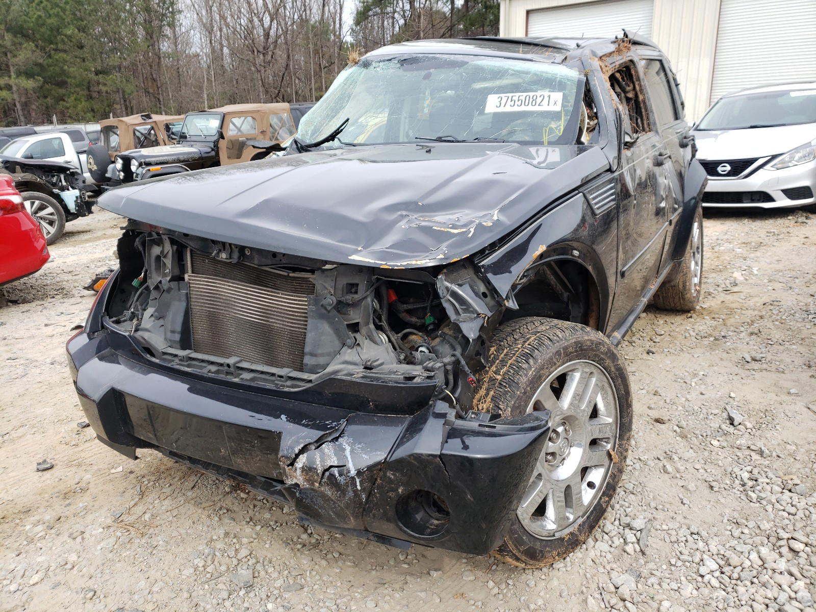 Photo 2 from auction – 2011 DODGE NITRO HEAT with VIN 1D4PT4GX8BW606486
