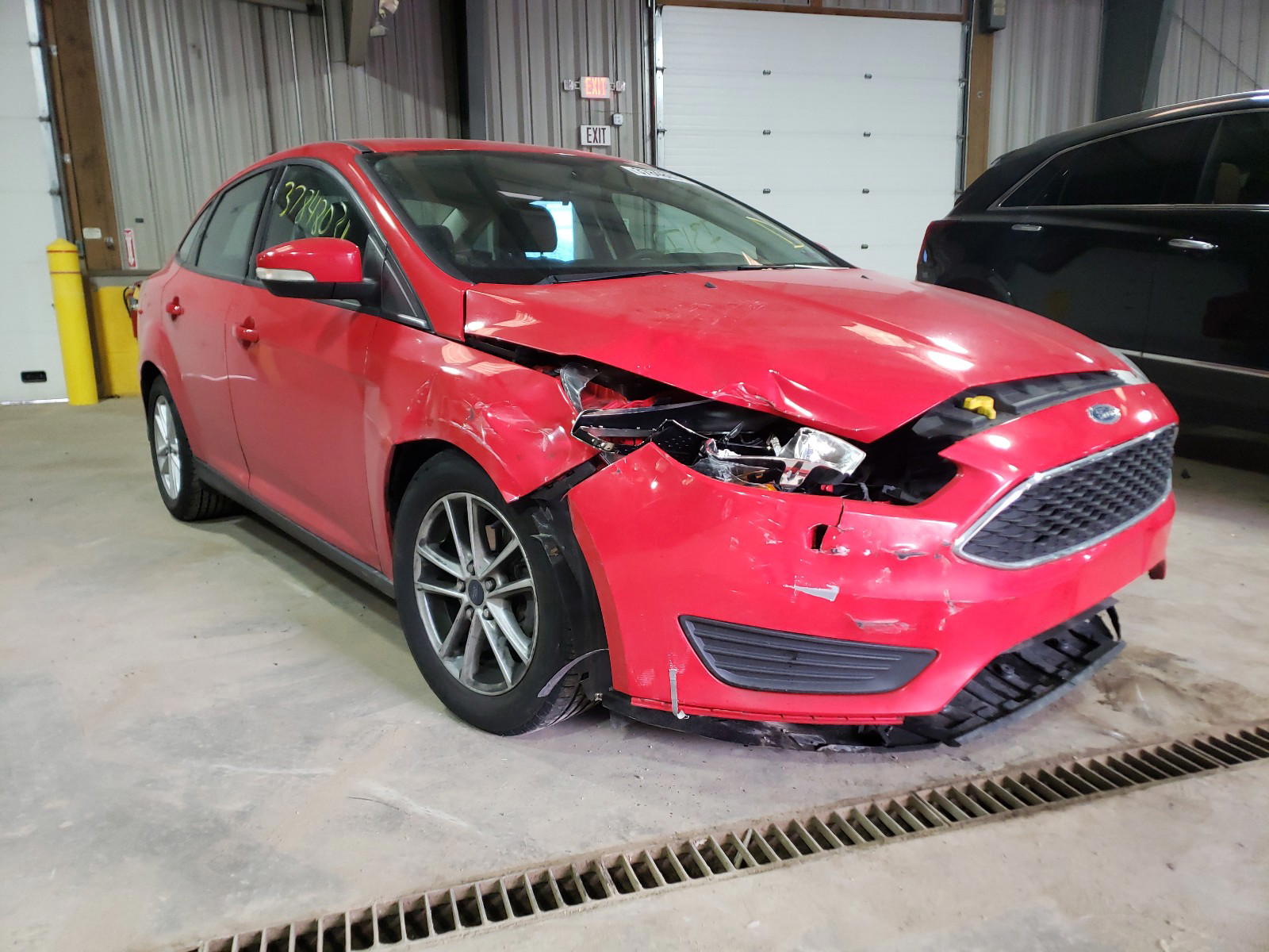 FORD FOCUS SE 2015 with VIN 1FADP3F2XFL292910 - Photo from auction