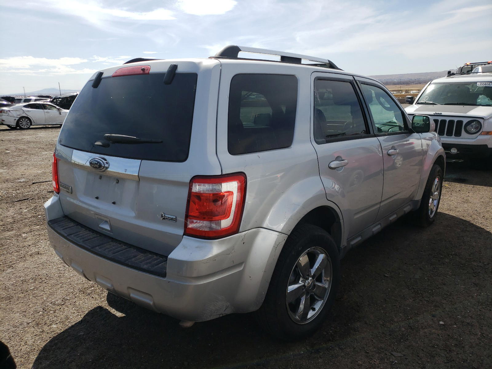 Photo 4 from auction – 2011 FORD ESCAPE LIM with VIN 1FMCU0EG4BKB65026
