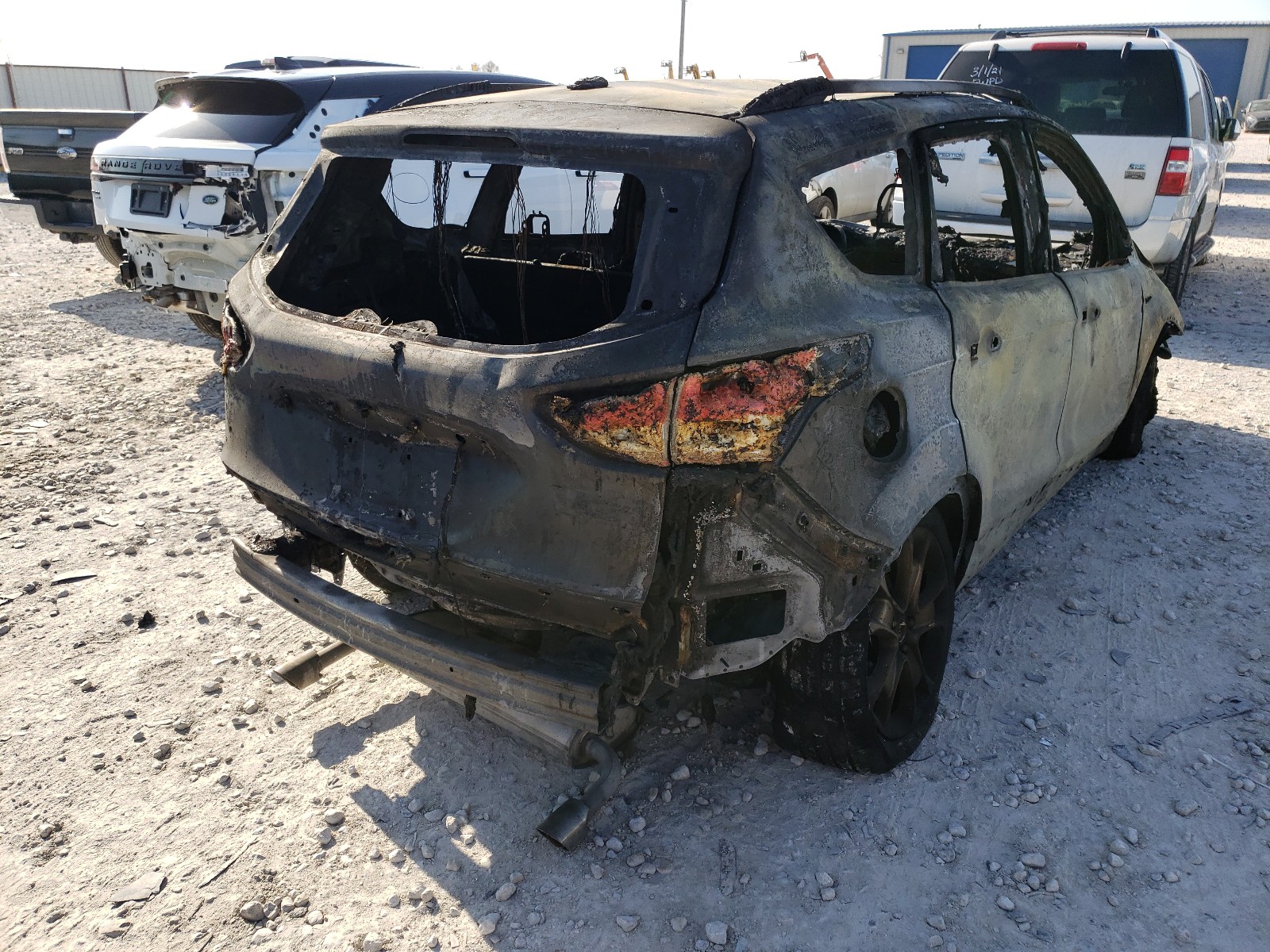 Photo 4 from auction – 2014 FORD ESCAPE TIT with VIN 1FMCU0JXXEUC16589
