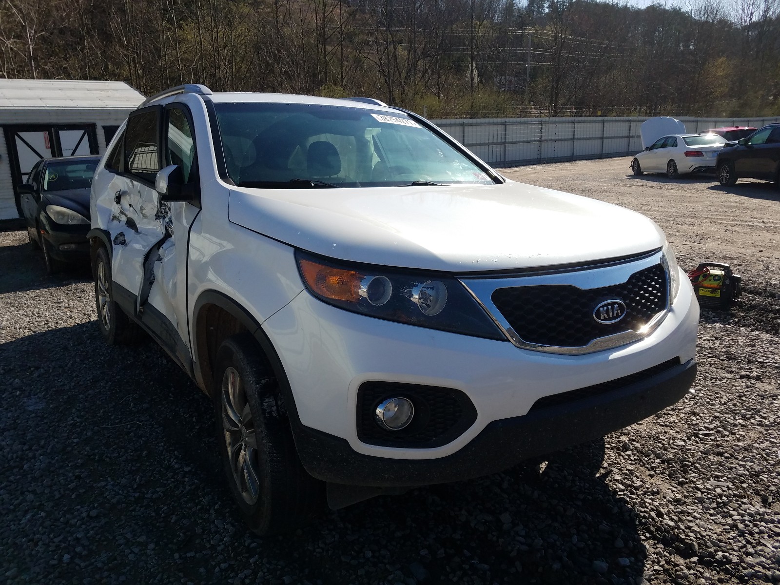 KIA SORENTO EX 2011 with VIN 5XYKUDA2XBG033394 - Photo from auction