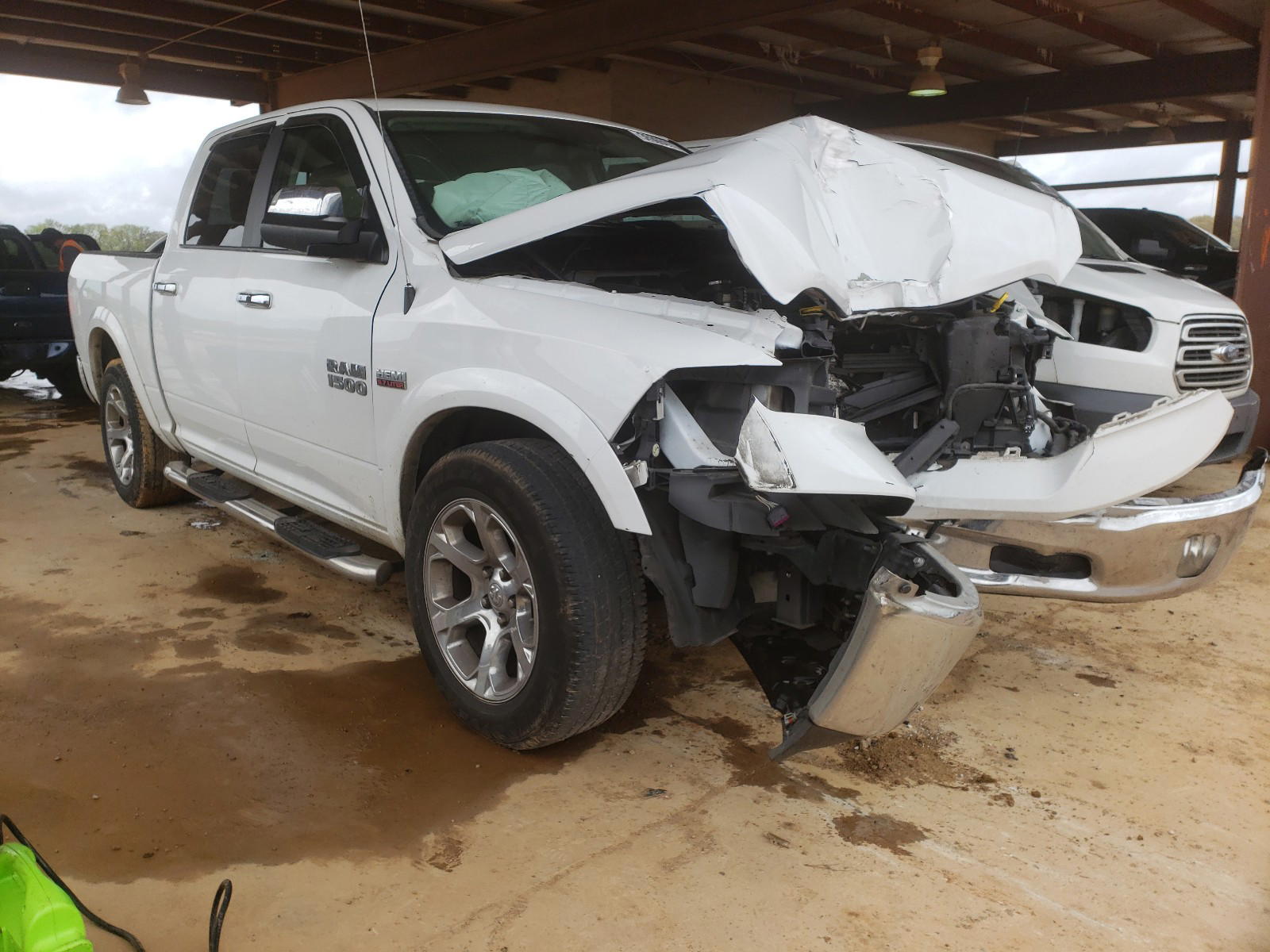 RAM 1500 LARAM 2016 with VIN 1C6RR6NT3GS101171 - Photo from auction