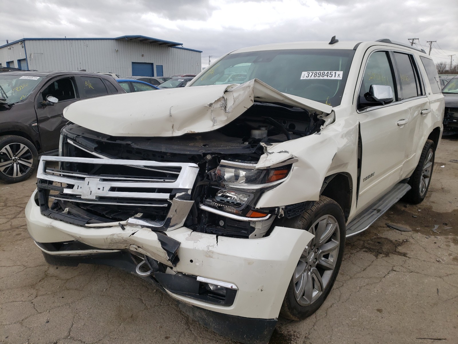 Photo 2 from auction – 2015 CHEVROLET TAHOE with VIN 1GNSKCKC8FR244440