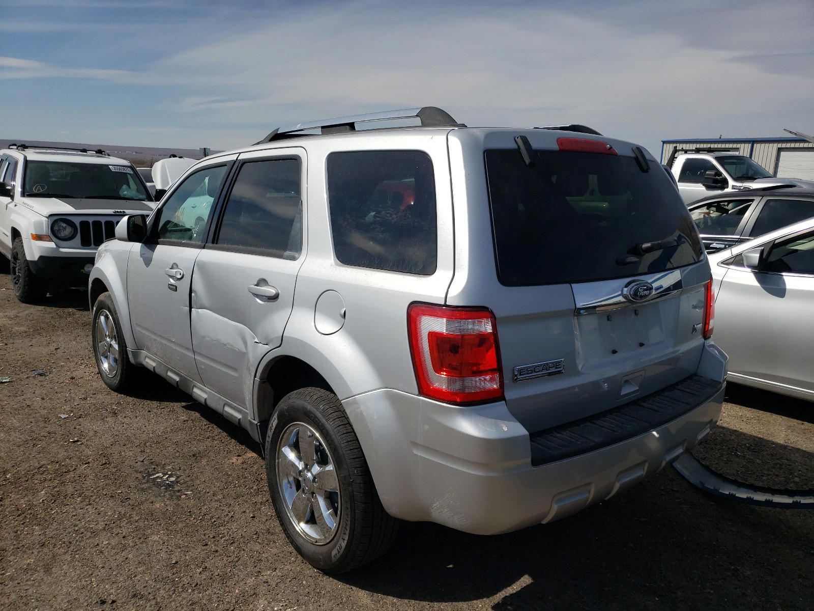 Photo 3 from auction – 2011 FORD ESCAPE LIM with VIN 1FMCU0EG4BKB65026