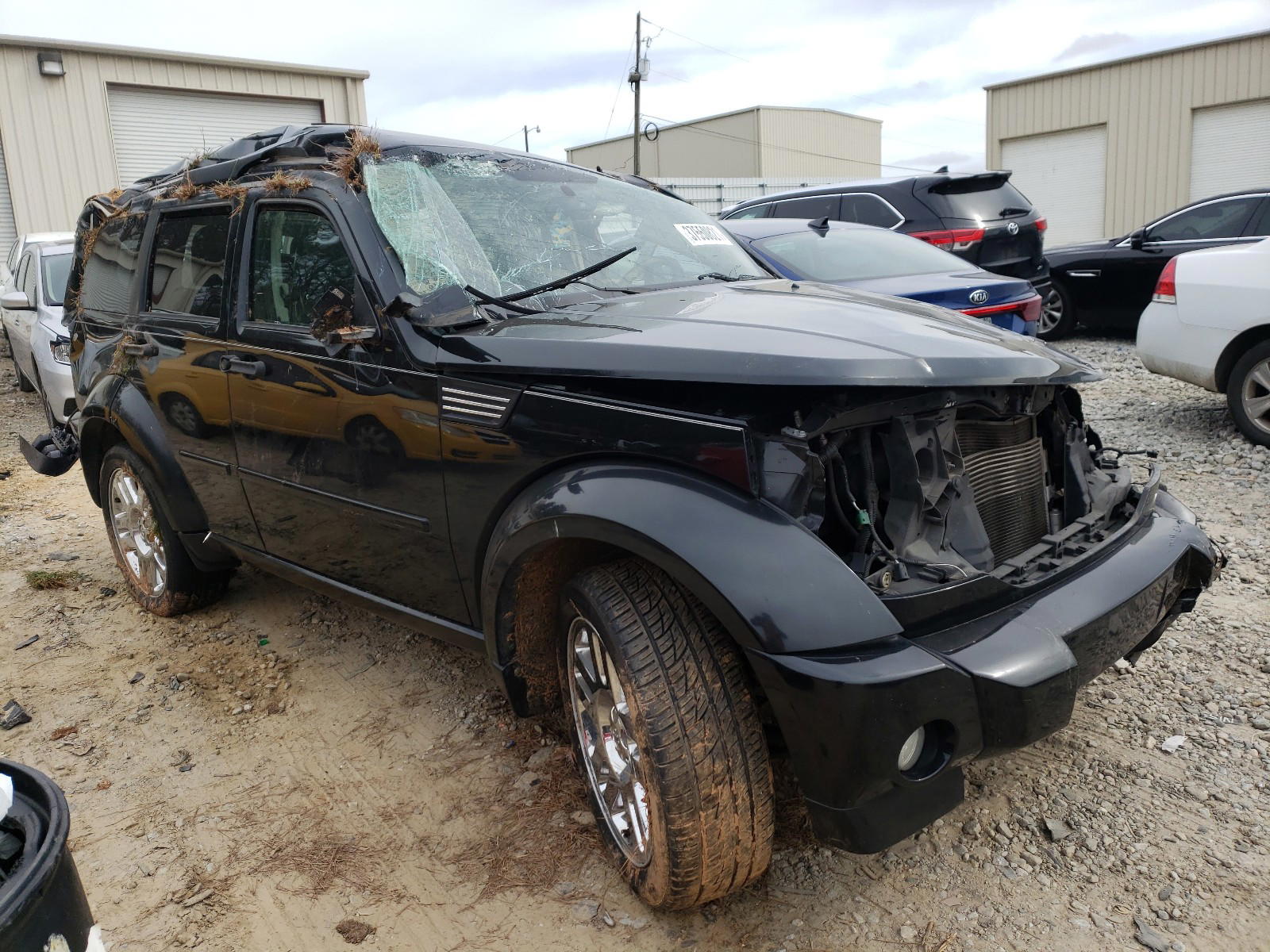 DODGE NITRO HEAT 2011 with VIN 1D4PT4GX8BW606486 - Photo from auction