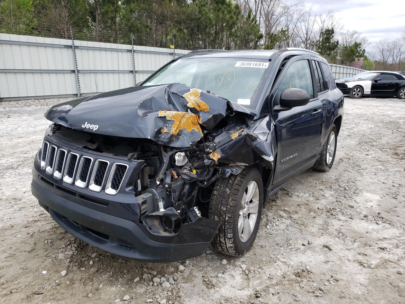 Photo 2 from auction – 2014 JEEP COMPASS SP with VIN 1C4NJDBB2ED649842