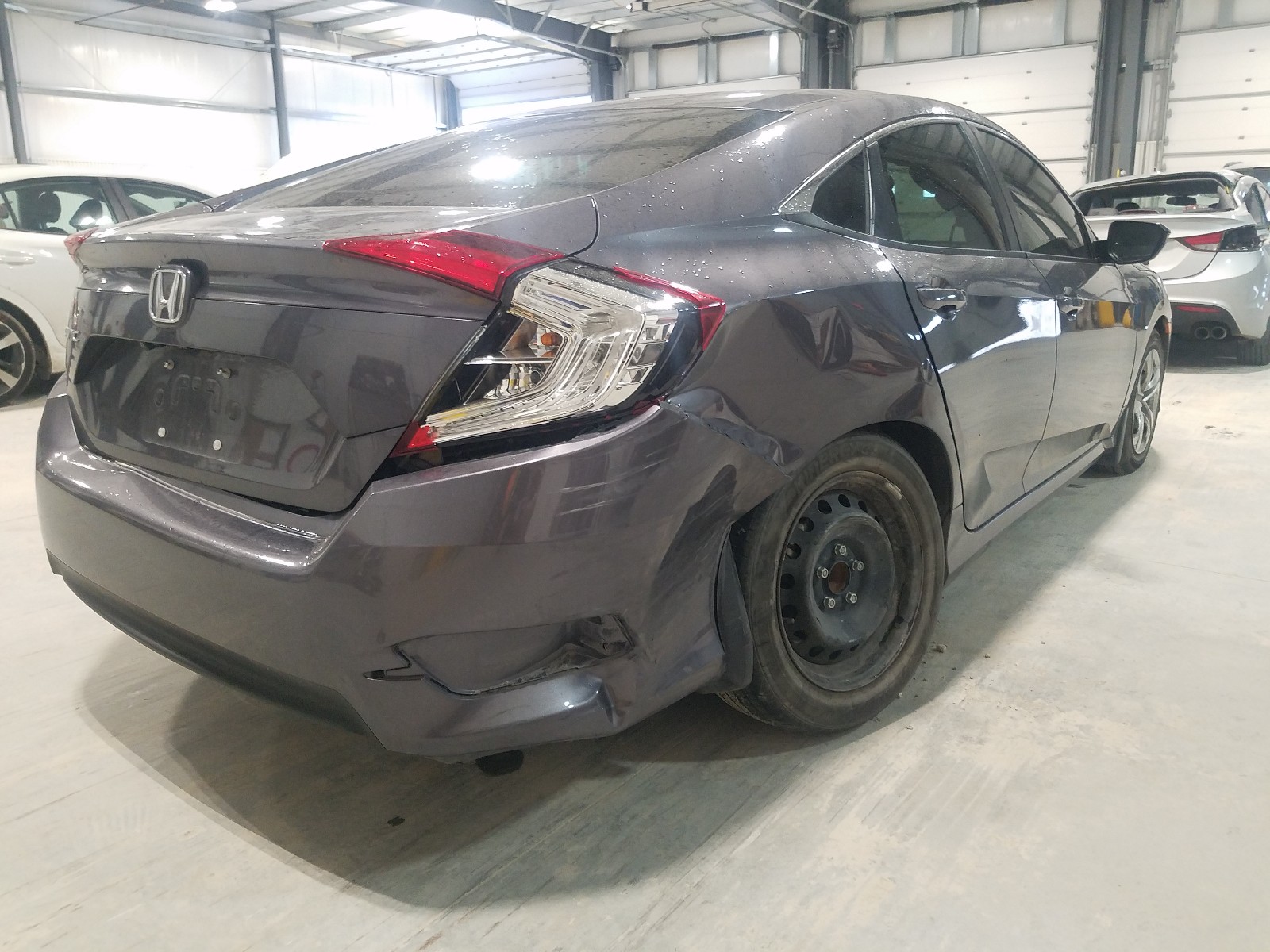 Photo 4 from auction – 2017 HONDA CIVIC LX with VIN 19XFC2F54HE045428