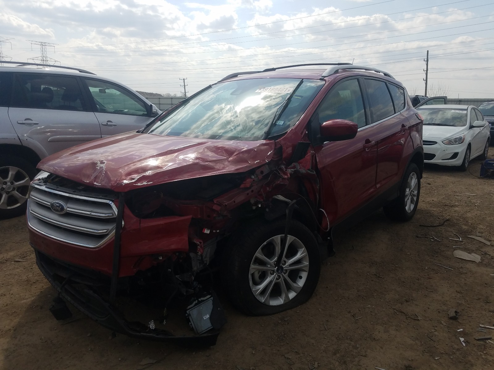 Photo 2 from auction – 2019 FORD ESCAPE SE with VIN 1FMCU0GD0KUC21602