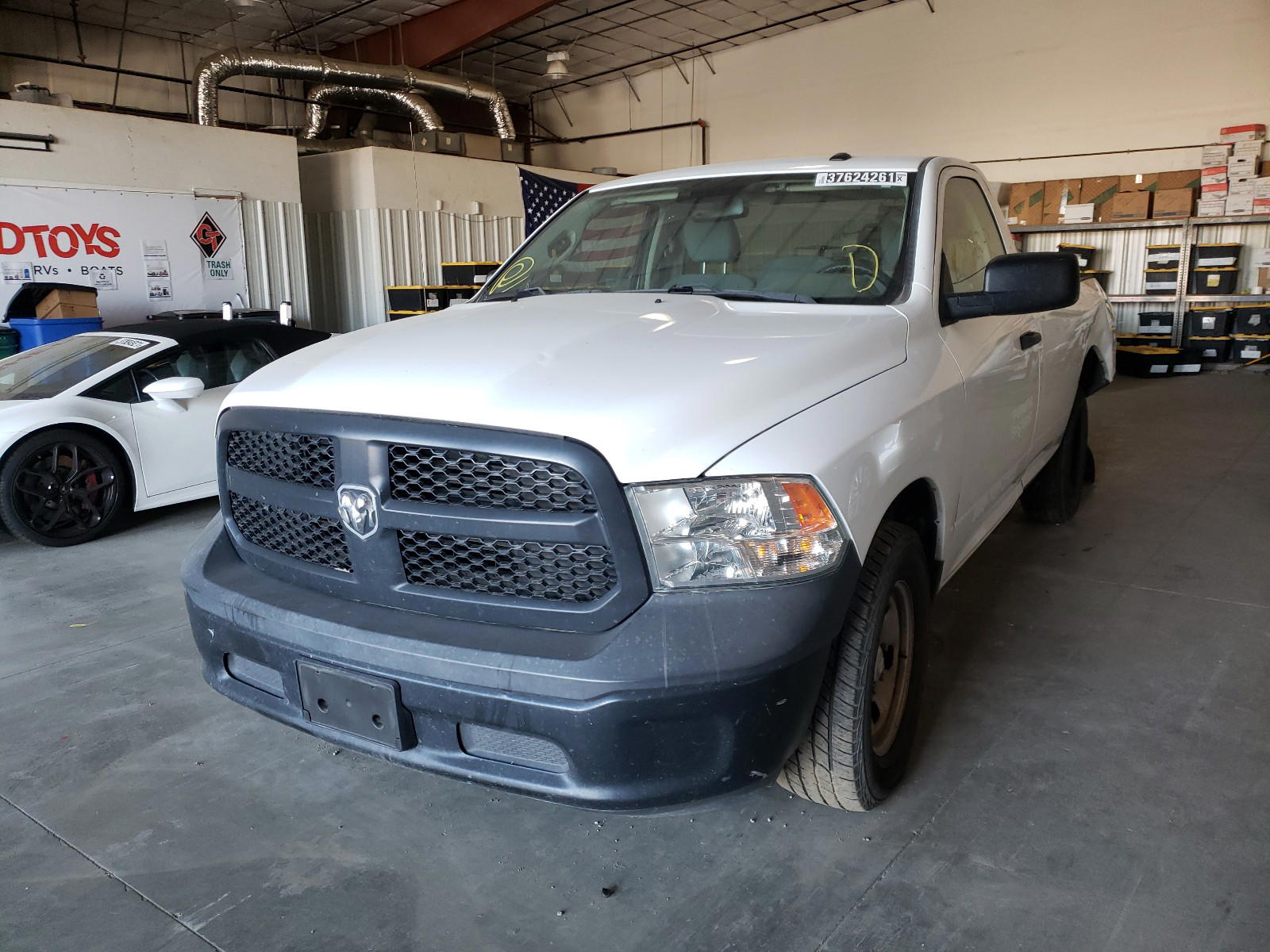 Photo 2 from auction – 2016 RAM 1500 ST with VIN 3C6JR6DG7GG290688