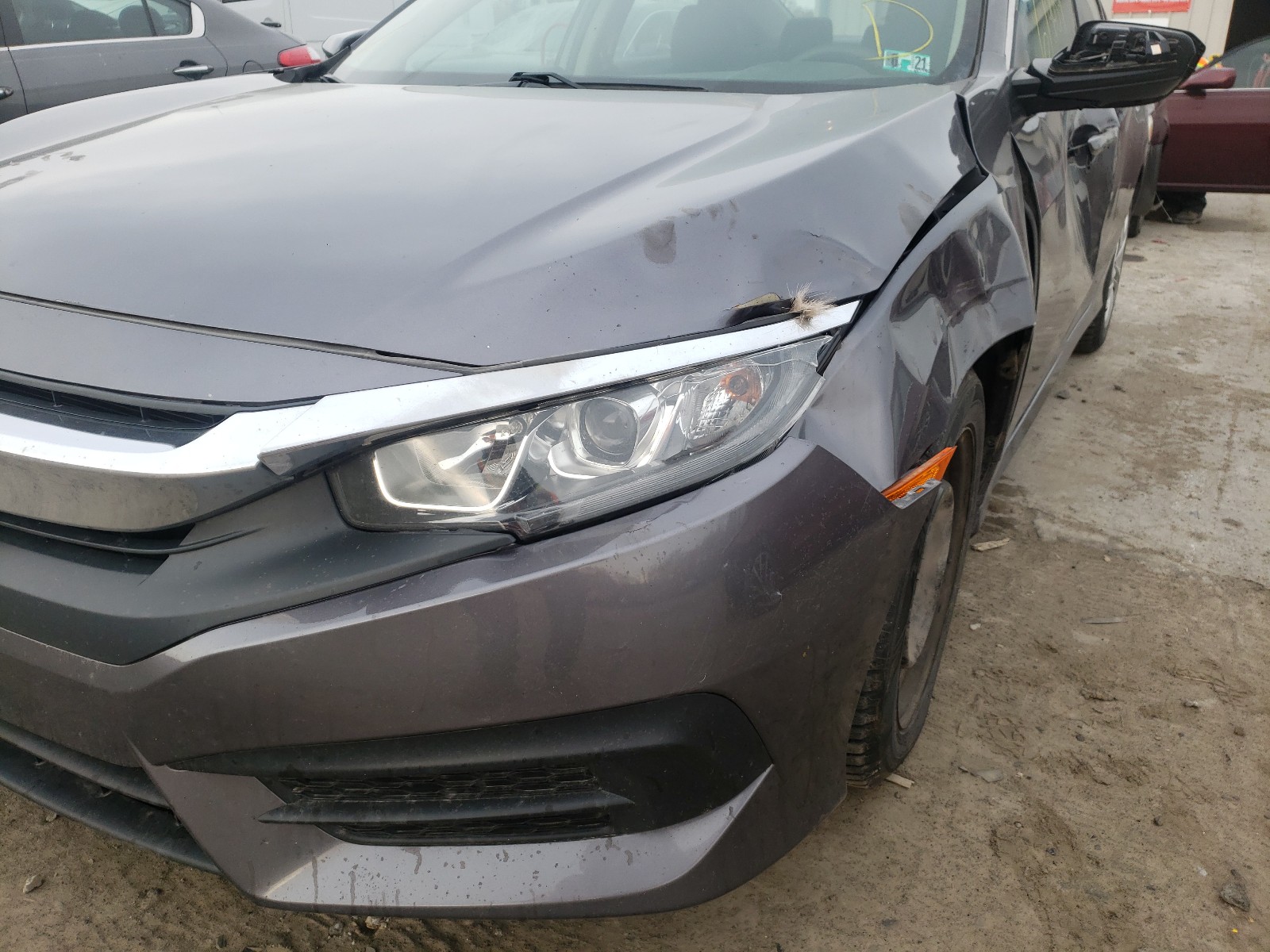 Photo 9 from auction – 2018 HONDA CIVIC LX with VIN 19XFC2E53JE016056