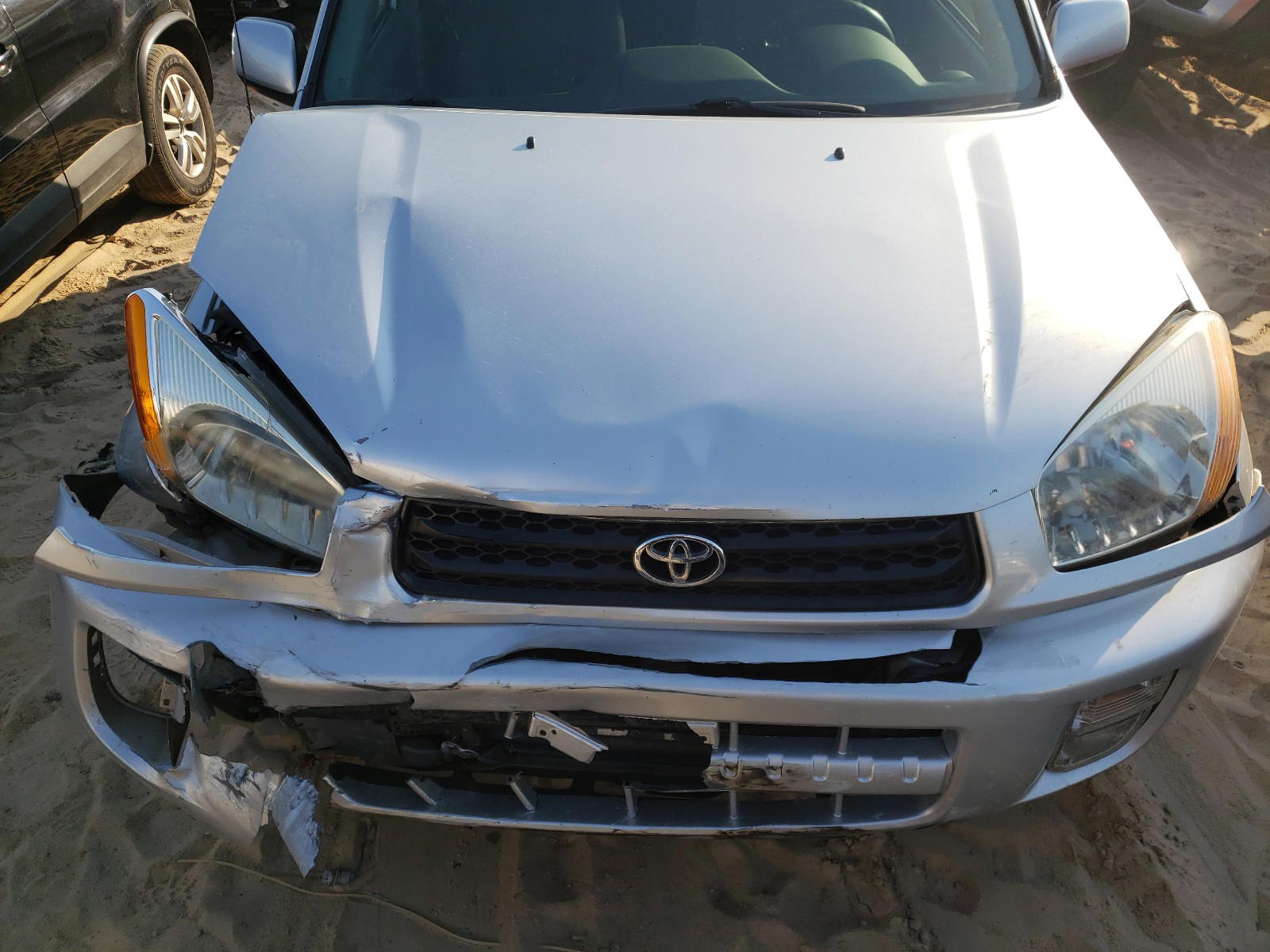 Photo 7 from auction – 2003 TOYOTA RAV4 with VIN JTEGH20V830112947
