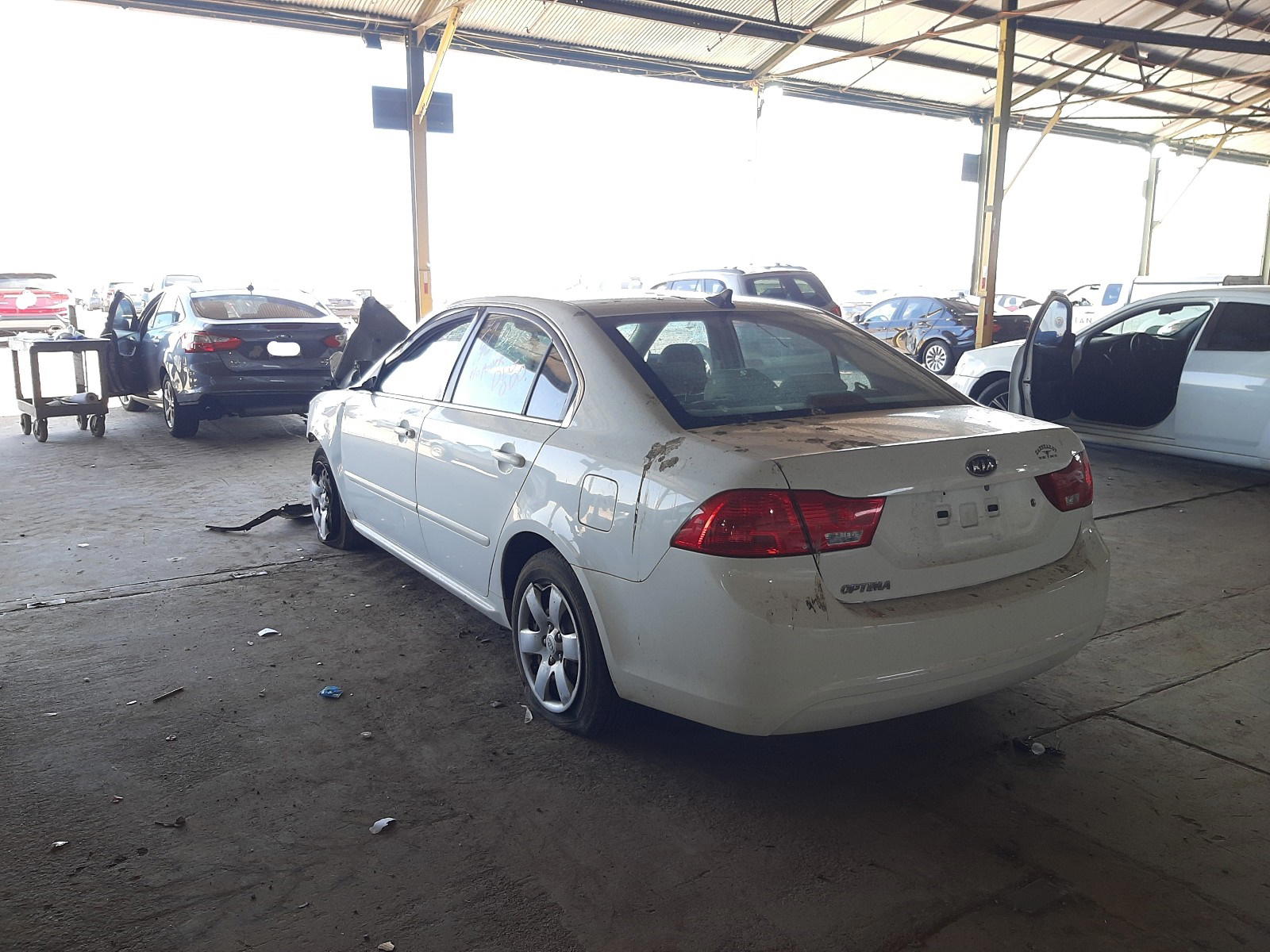 Photo 3 from auction – 2010 KIA OPTIMA LX with VIN KNAGG4A87A5429885