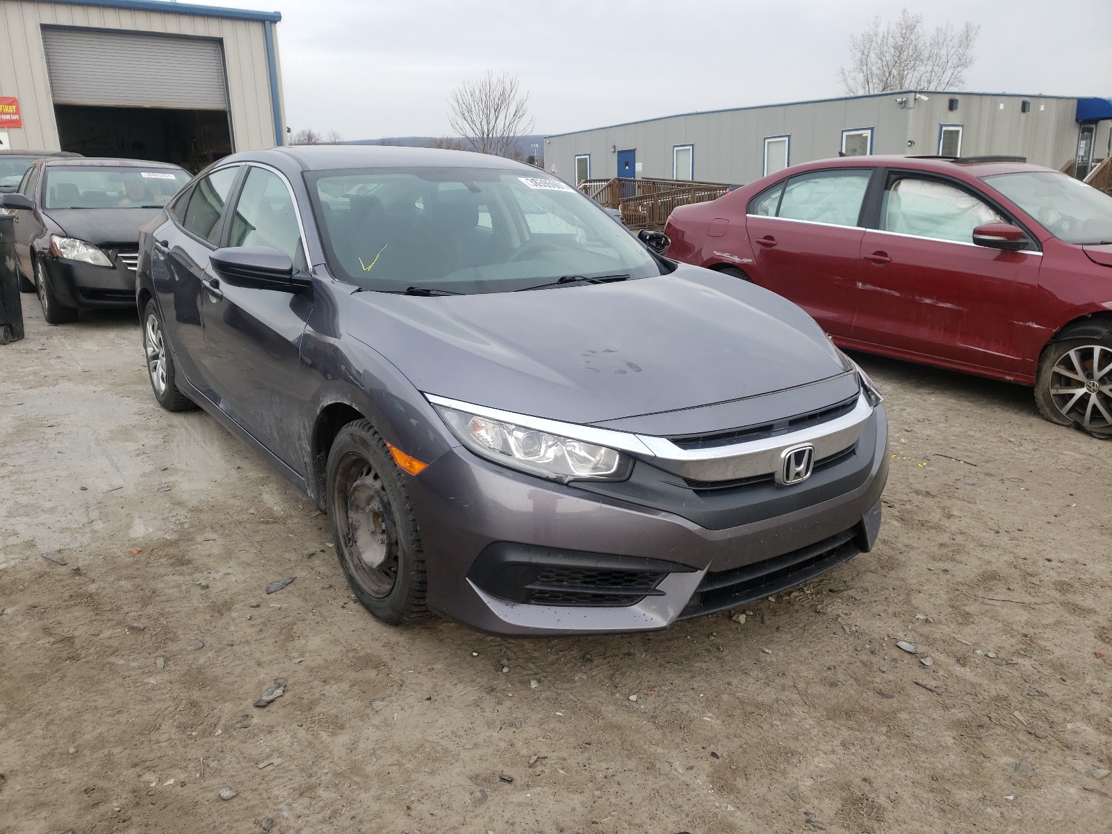 Photo 1 from auction – 2018 HONDA CIVIC LX with VIN 19XFC2E53JE016056