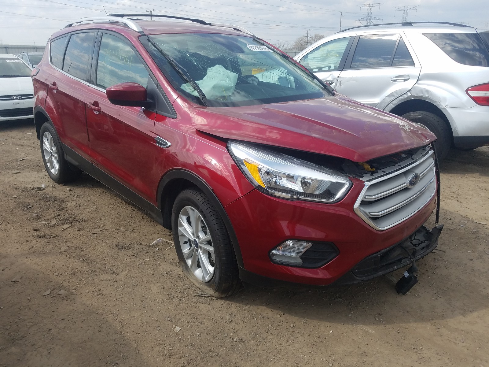 FORD ESCAPE SE 2019 with VIN 1FMCU0GD0KUC21602 - Photo from auction