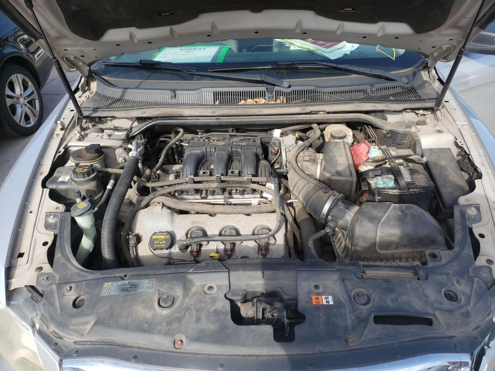Photo 7 from auction – 2011 FORD TAURUS SE with VIN 1FAHP2DW3BG109738