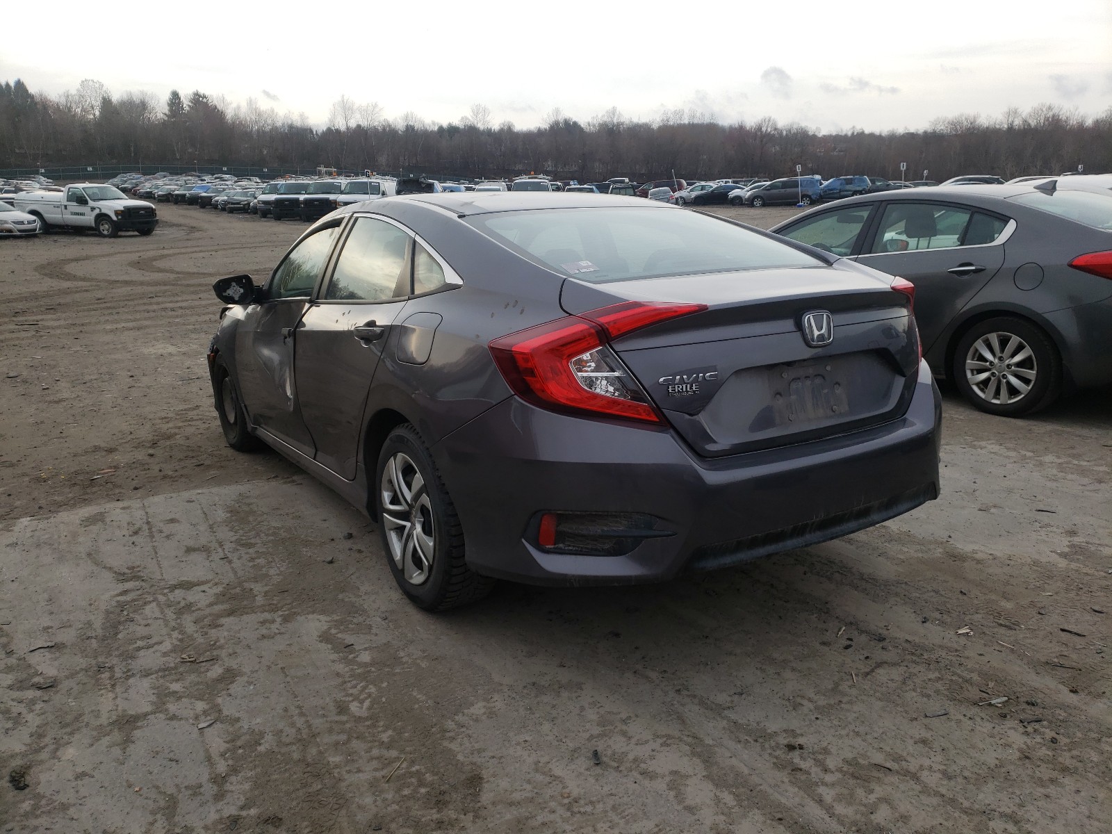 Photo 3 from auction – 2018 HONDA CIVIC LX with VIN 19XFC2E53JE016056