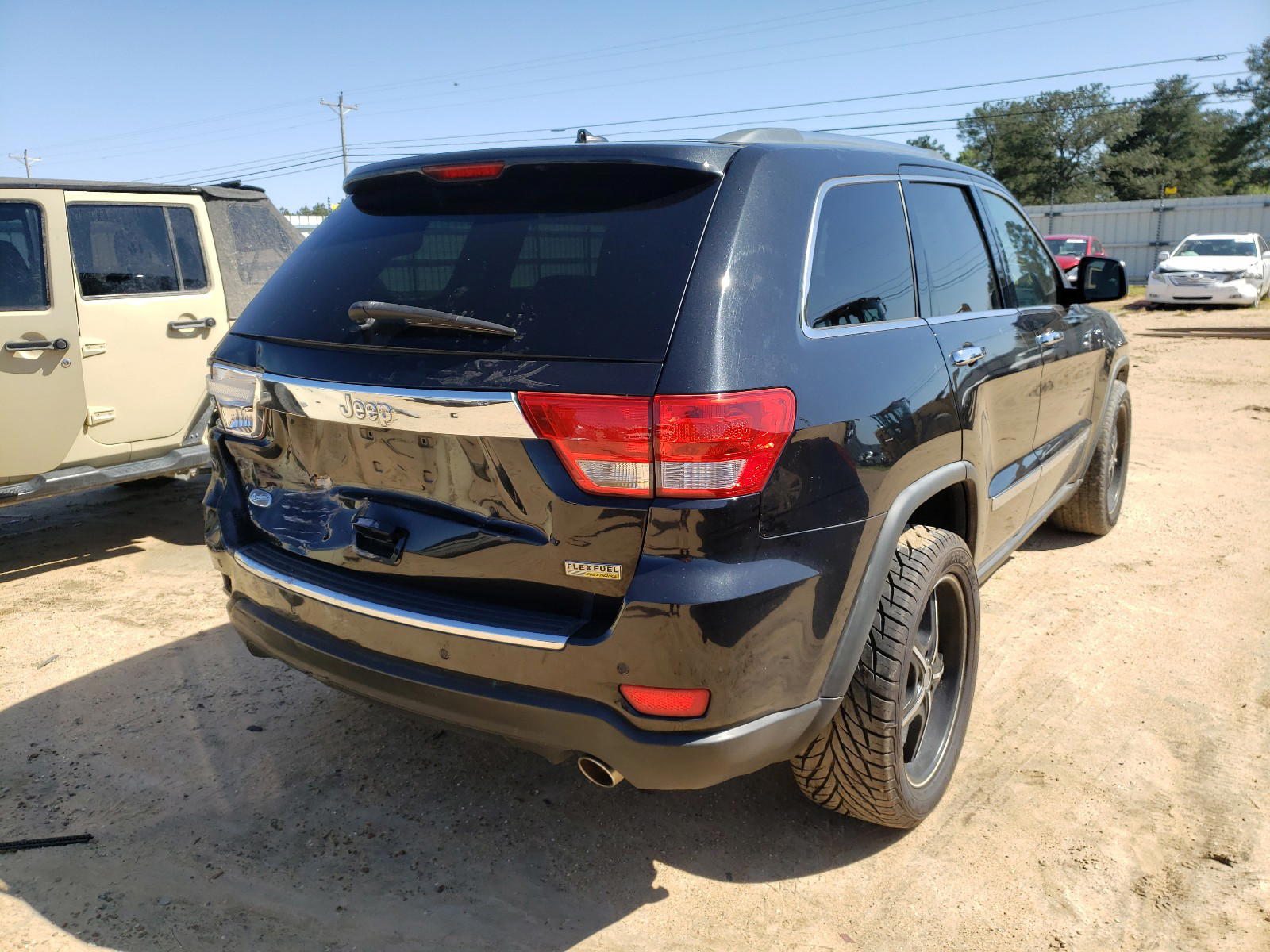 Photo 4 from auction – 2011 JEEP GRAND CHER with VIN 1J4RS6GG2BC637541