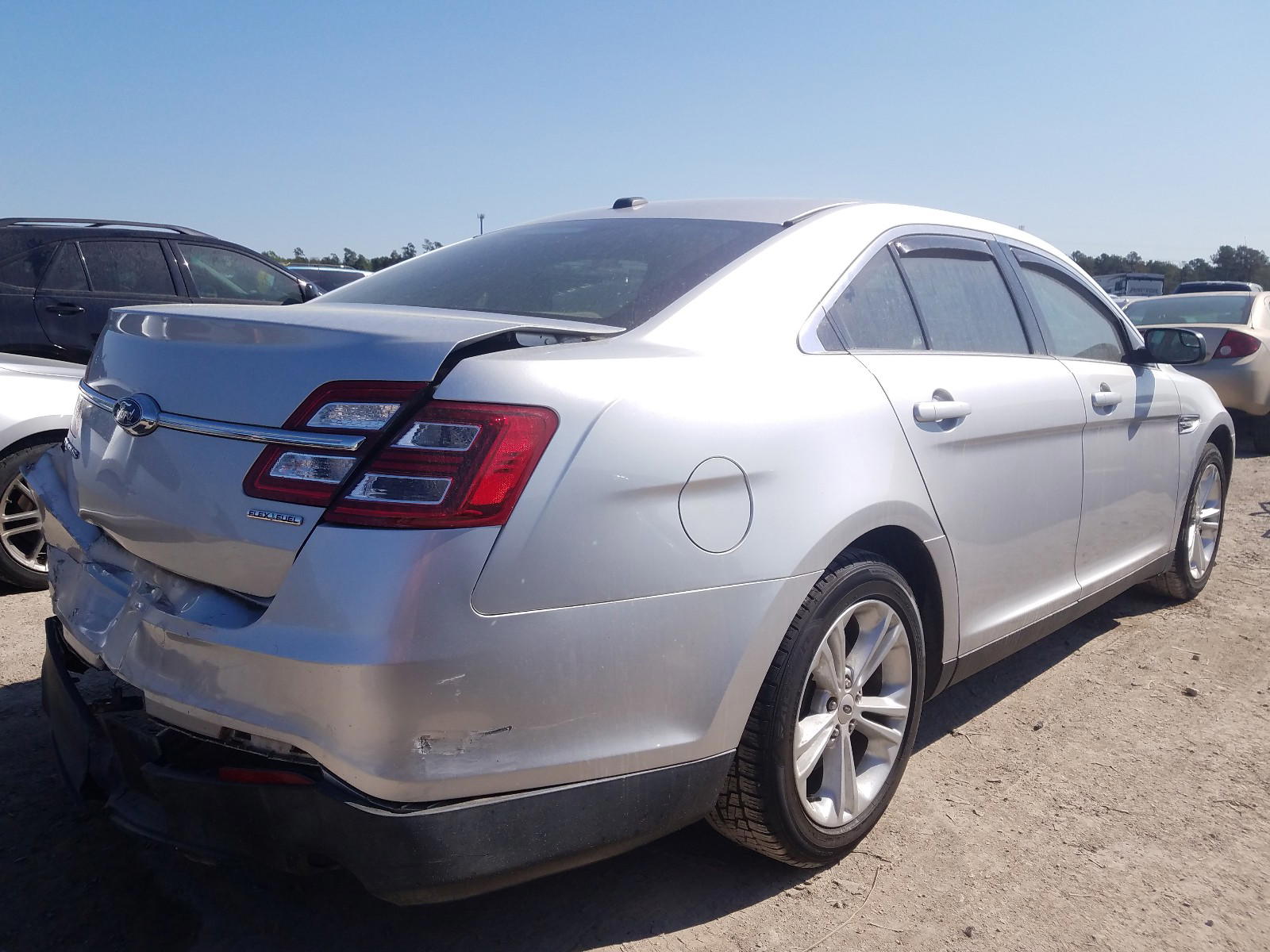 Photo 4 from auction – 2015 FORD TAURUS SE with VIN 1FAHP2D81FG155334