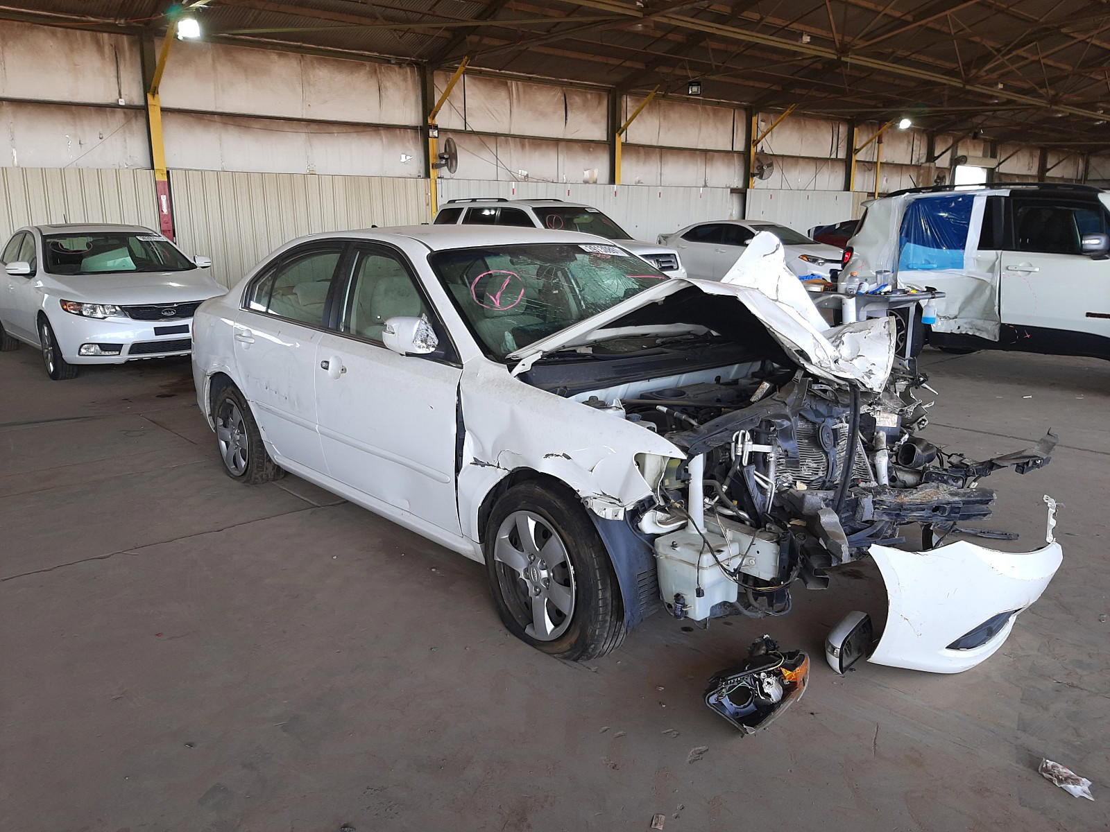 KIA OPTIMA LX 2010 with VIN KNAGG4A87A5429885 - Photo from auction