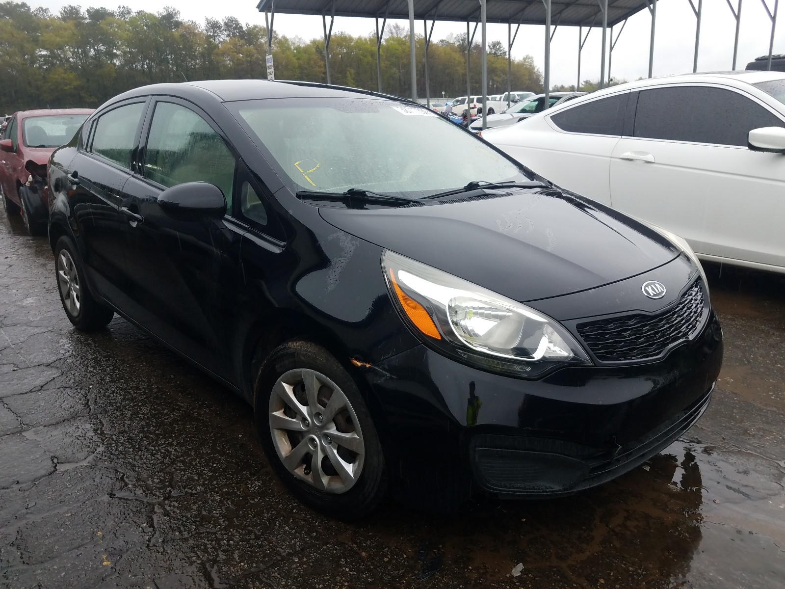 KIA RIO LX 2013 with VIN KNADM4A33D6118727 - Photo from auction